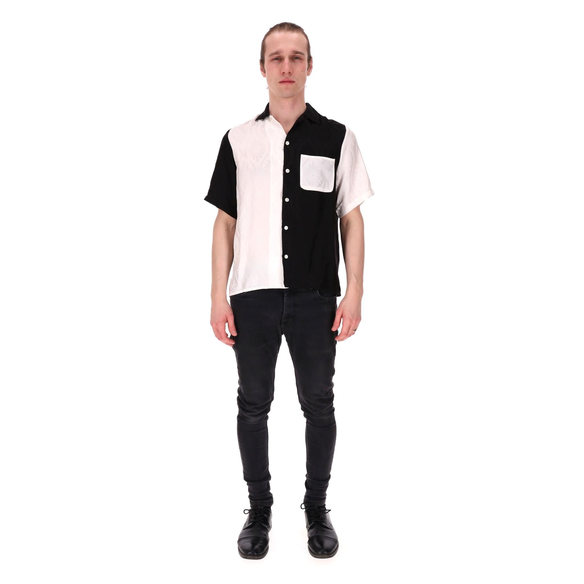 Nipoaloha Colour-Block Silk Jacquard Shirt

Black and white shirt fully crafted from silk in colour-block, jacquard design.

Featuring straight-cut, short sleeves and centre button fastening.

Rrp Approx. £450

Size – S

Condition – Very
