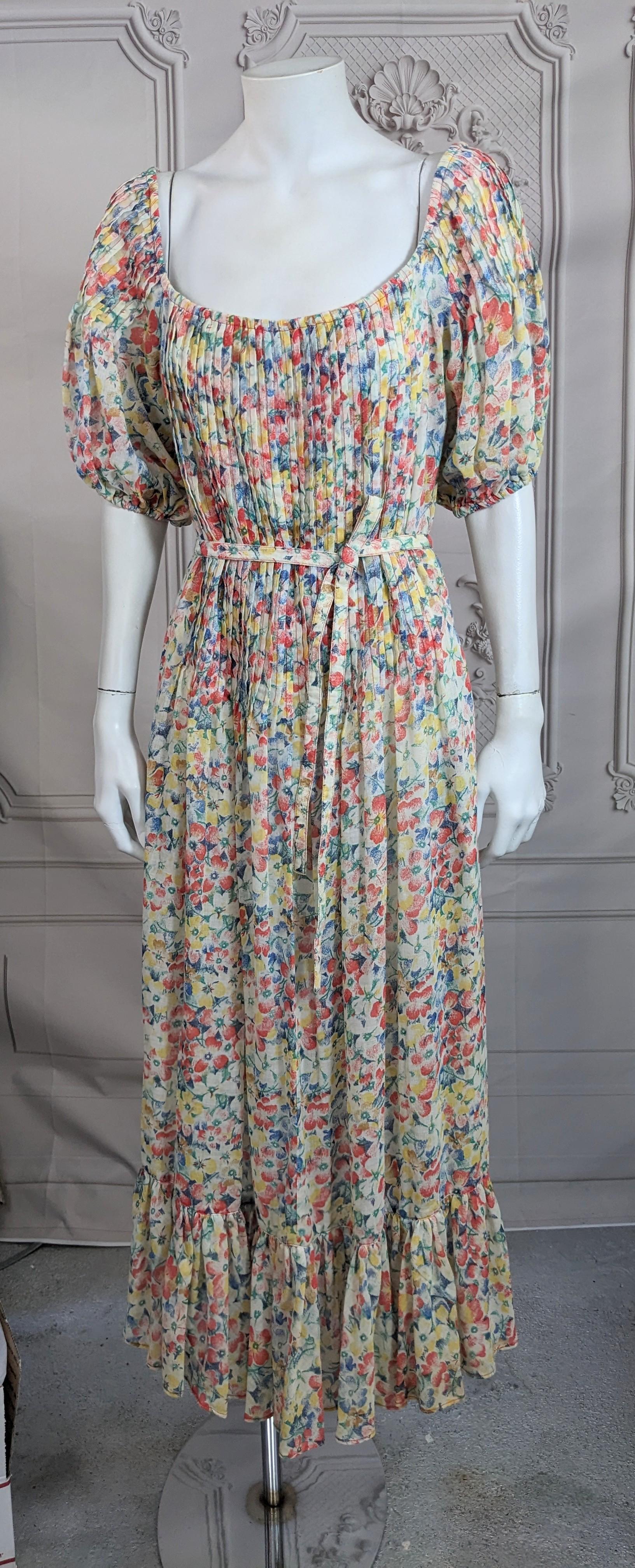 Charming Nipon Boutique Pin Tucked Floral Dress with self belt. Pin tucked on bodice and puff sleeves with ruffled hem. Back zip entry with wide scoop neckline. Size 8 Vintage. 1980's USA. Semi sheer rayon cotton voile. 