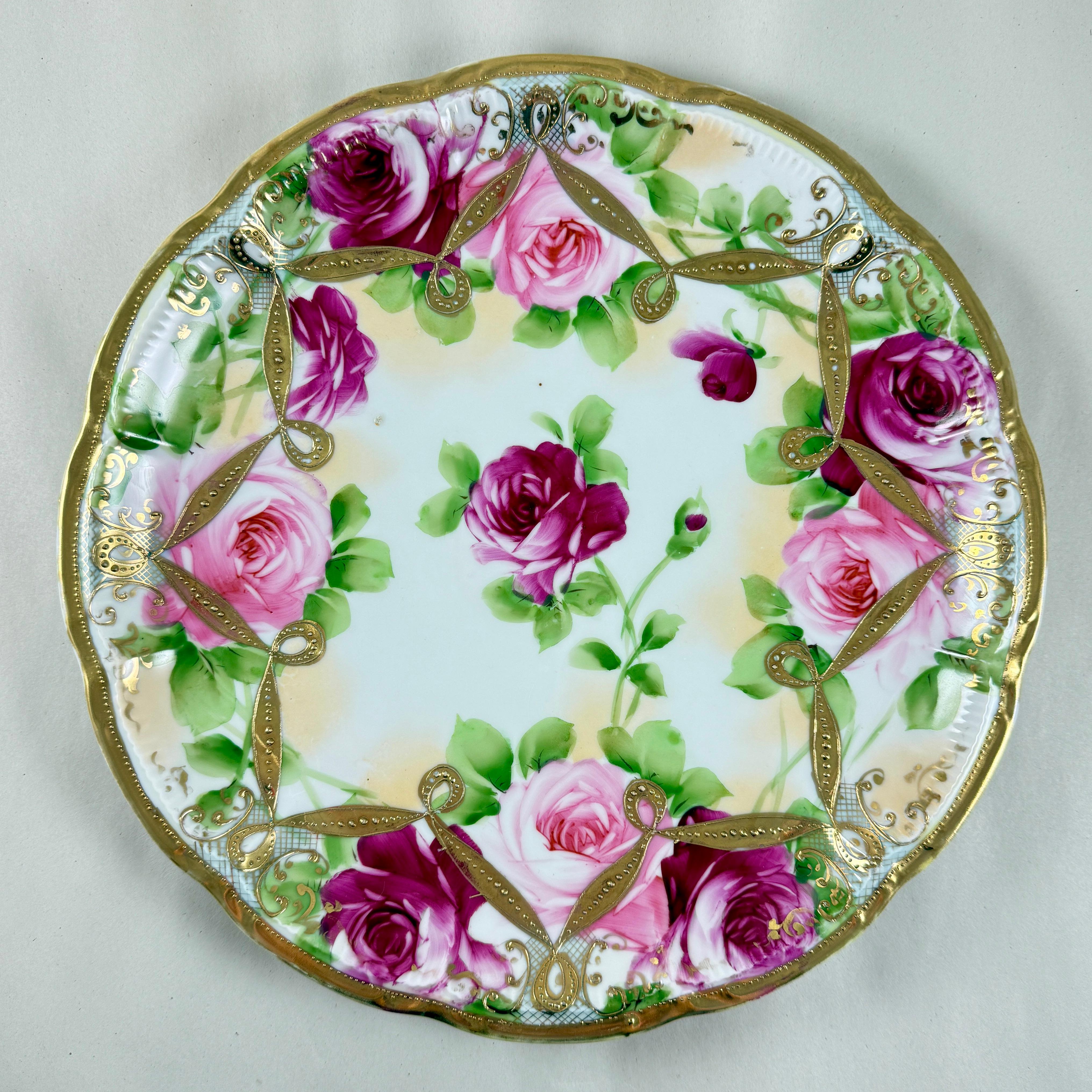 From Japan, a large hand-painted Nippon porcelain cabinet or wall plate showing roses and gilded accents, circa 1900.

Nippon porcelain was made in Japan from 1891 to 1921. Nippon is the Japanese word for “Japan.” Nippon porcelain was made to be