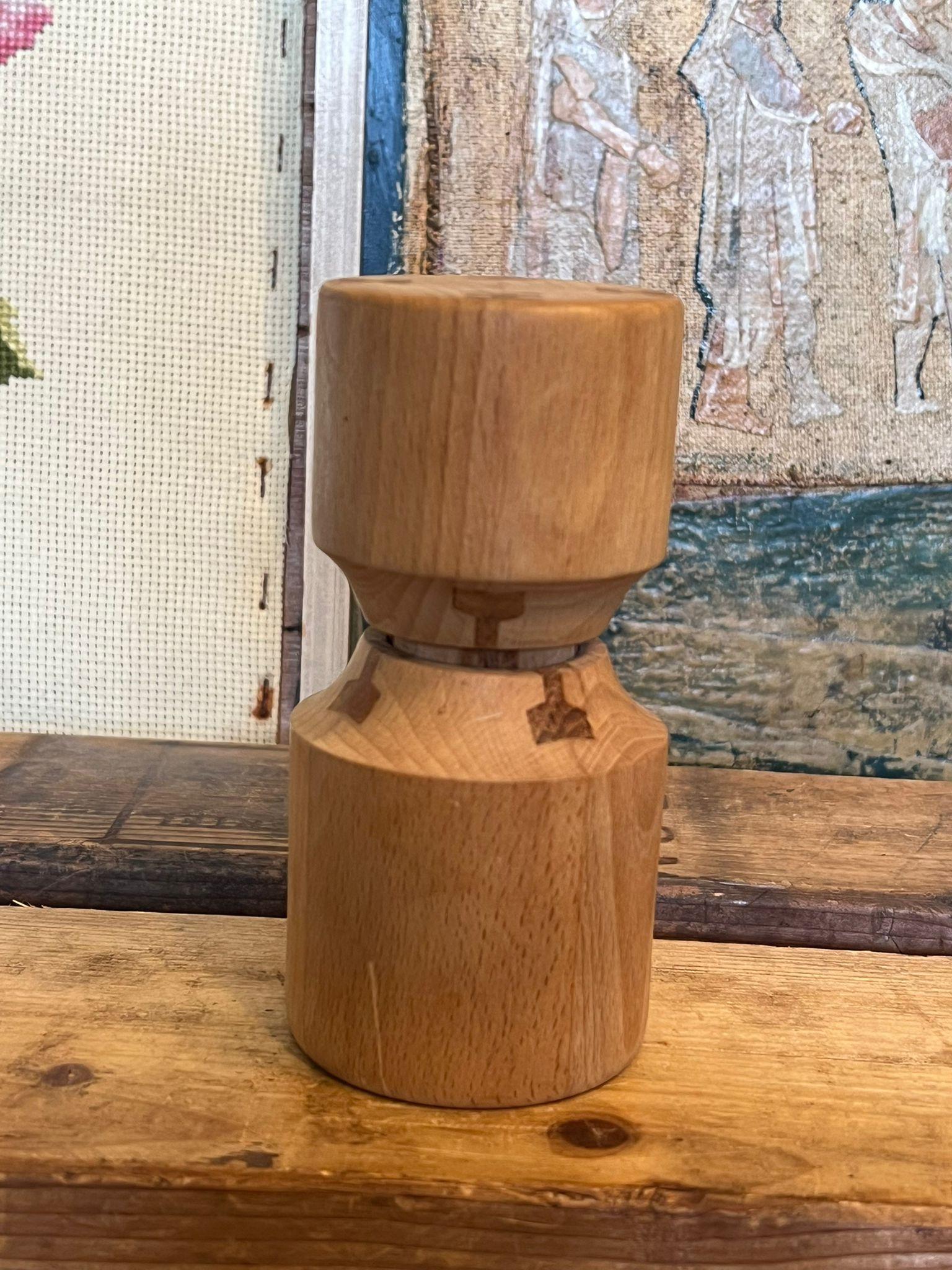 Single Shaker MCM Nissan. Piece has nice patina and character. Vintage Condition as pictured. Listing is for described item only. 

Dimensions. 2.75” Diameter ; 5.5” H