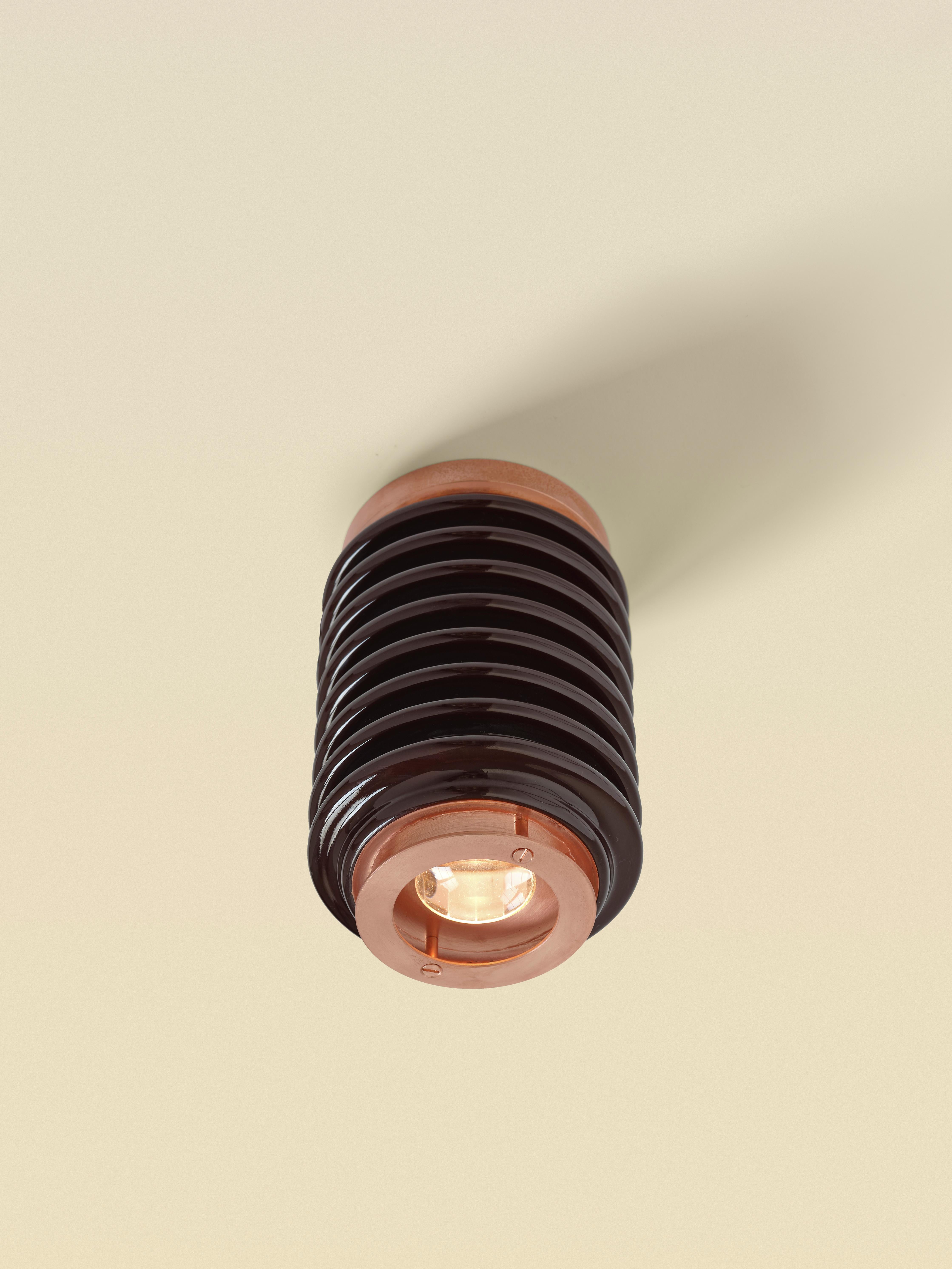 Ceramic C1 Light, 2022

Rooted in the intersection of man and nature, this uncanny collection employs recyclable, metalized ceramic insulator modules — conventionally used in electrical grids and poles — to form ambient spotlights via a patented