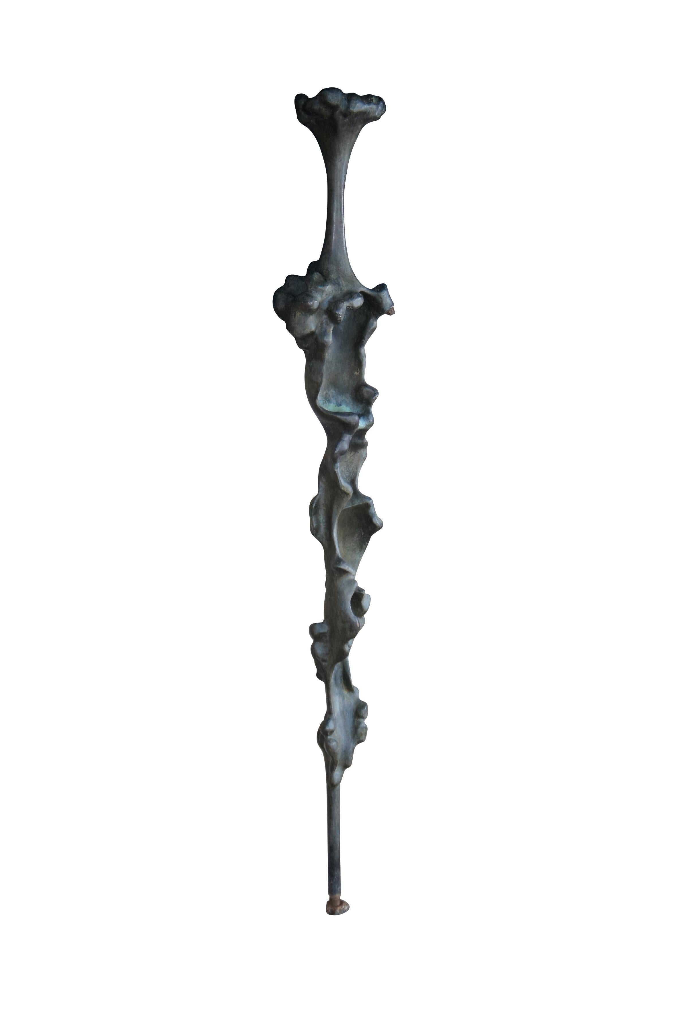 Standing Woman by Nita Sunderland, Features an abstract form of a Standing women. Circa 1960s  Mounts via iron pipe along base.

Dimensions:
60