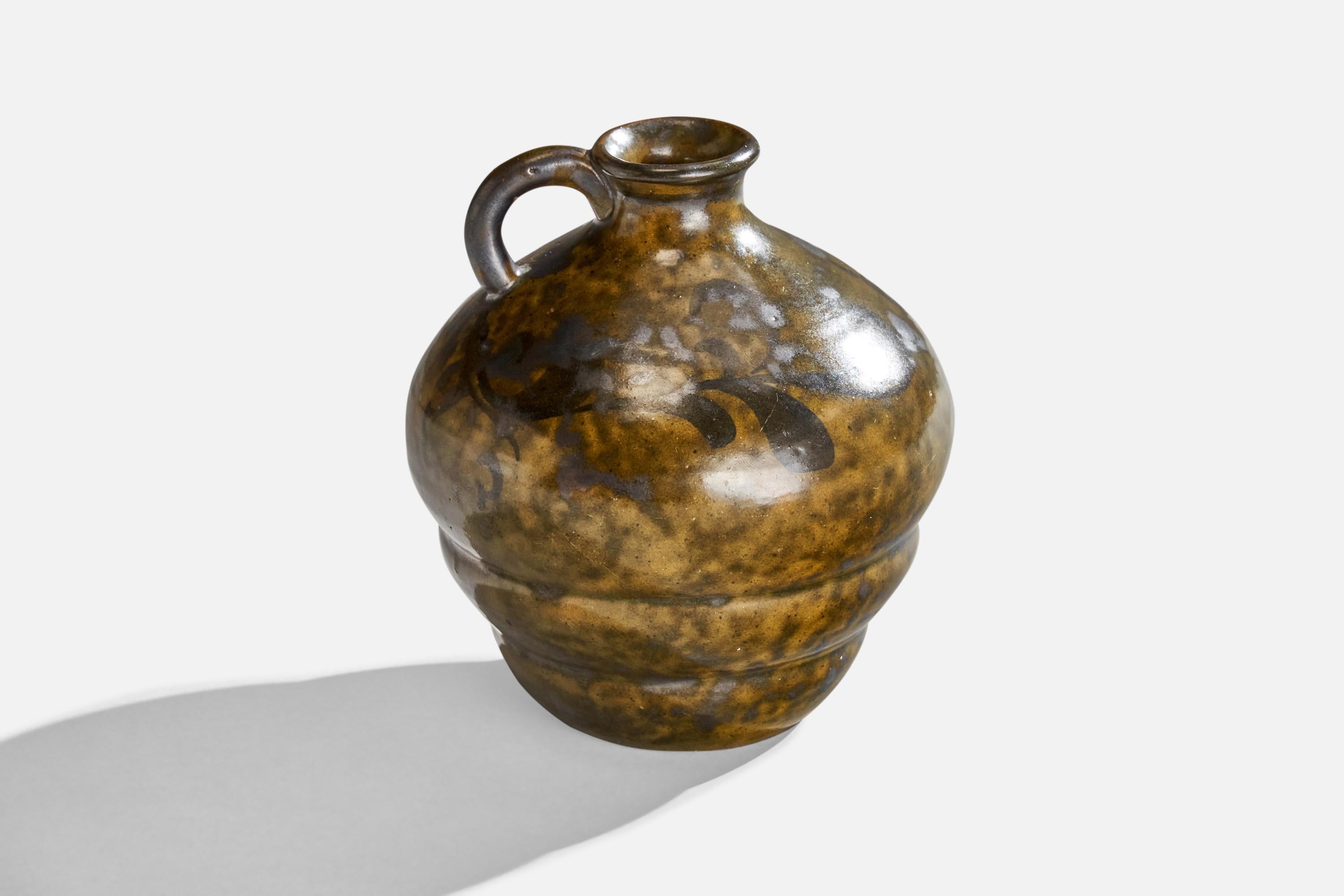 A black and beige-glazed ceramic pitcher designed and produced by Nittsjö, Sweden, 1930s.
