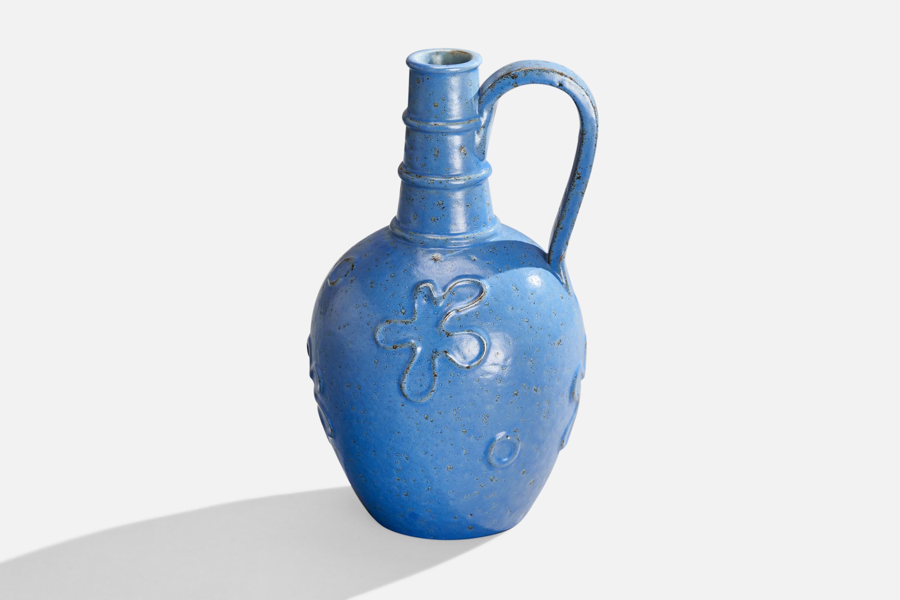 A blue-glazed ceramic pitcher designed and produced by Nittsjö, Sweden, 1930s.