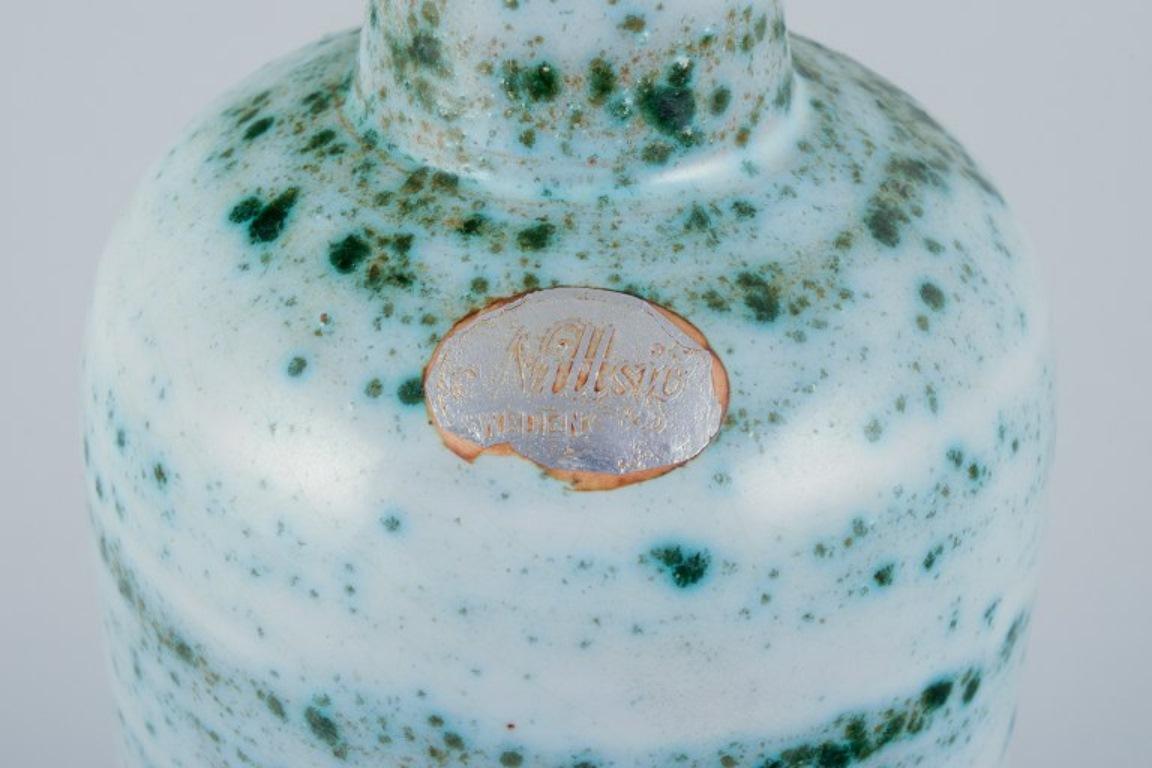 Glazed Nittsjö, Sweden, ceramic vase. Green shaded glaze on a white base. For Sale