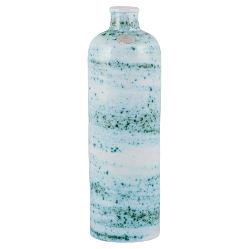 Nittsjö, Sweden, ceramic vase. Green shaded glaze on a white base. For Sale
