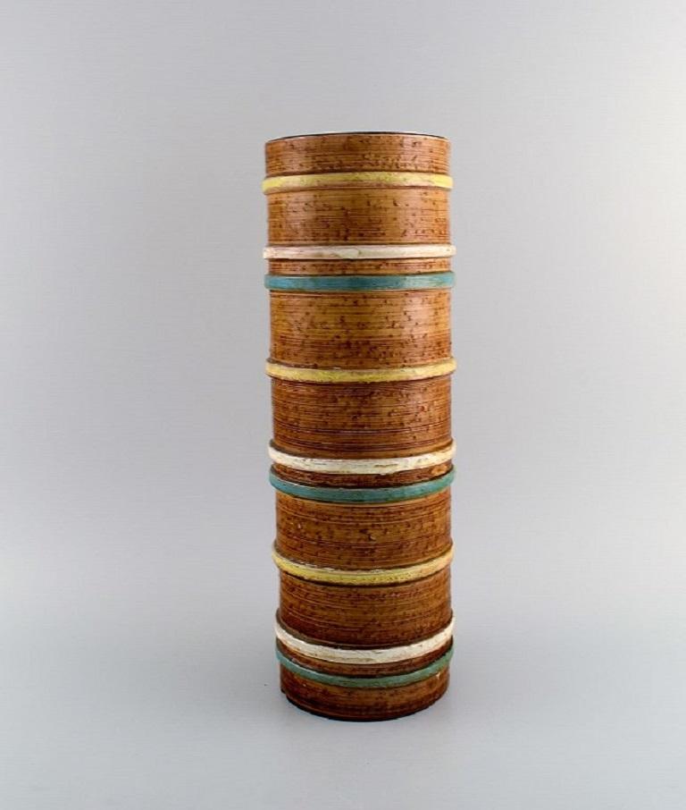Nittsjö, Sweden. Large vase in glazed stoneware. 
Beautiful glaze in a striped design. 1960s.
Measures: 41 x 15 cm.
In excellent condition.
Signed.