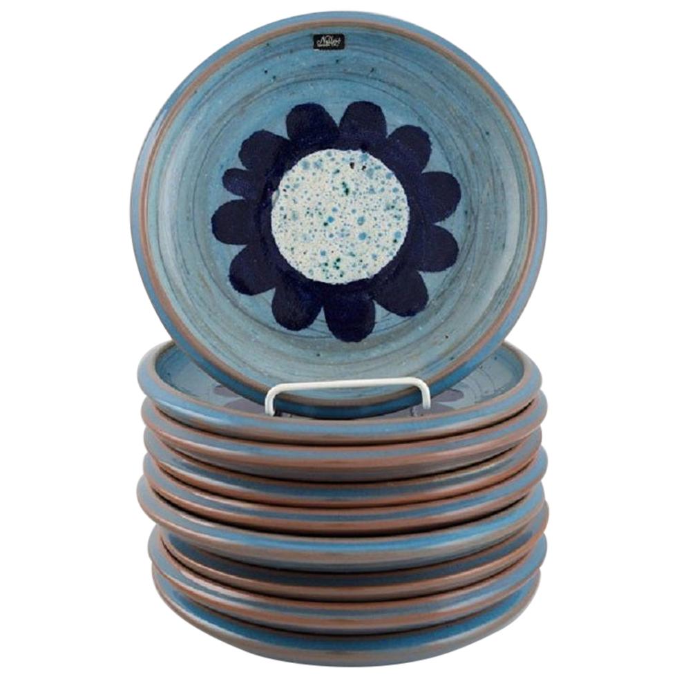 Nittsjö, Sweden, Nine Retro Plates in Glazed Stoneware, 1960s For Sale