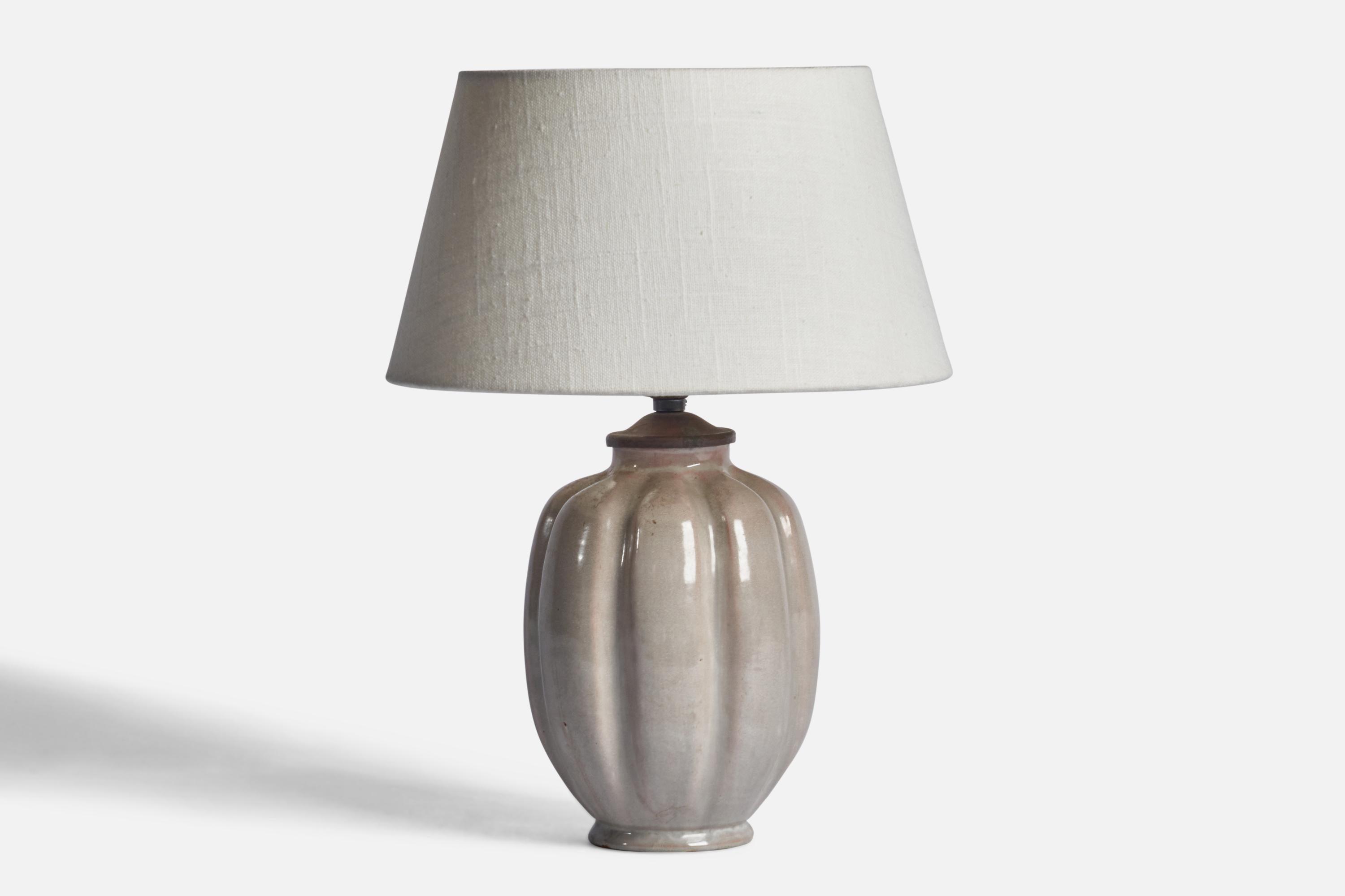 A light grey-glazed and fluted earthenware table lamp designed and produced by Nittsjö, Sweden, 1940s.

Dimensions of Lamp (inches): 10.5
