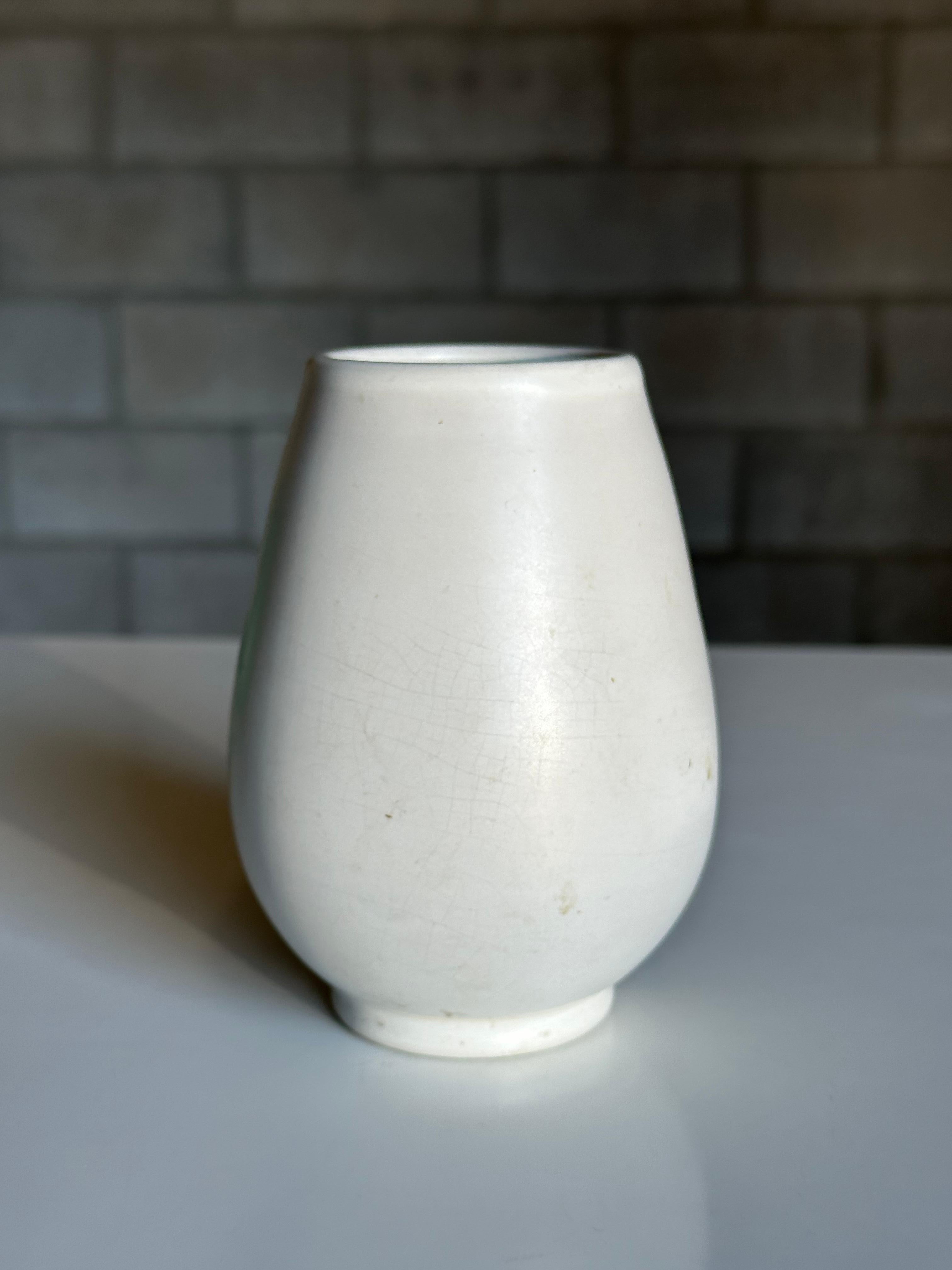 A wonderful vase produced by Nittsjö and attributed to Jerk Werkmäster. Great classic form vase with minimalist palette would allow for use in a variety of interior decors- minimalist, modern, contemporary, organic modern, Scandinavian, etc. 
