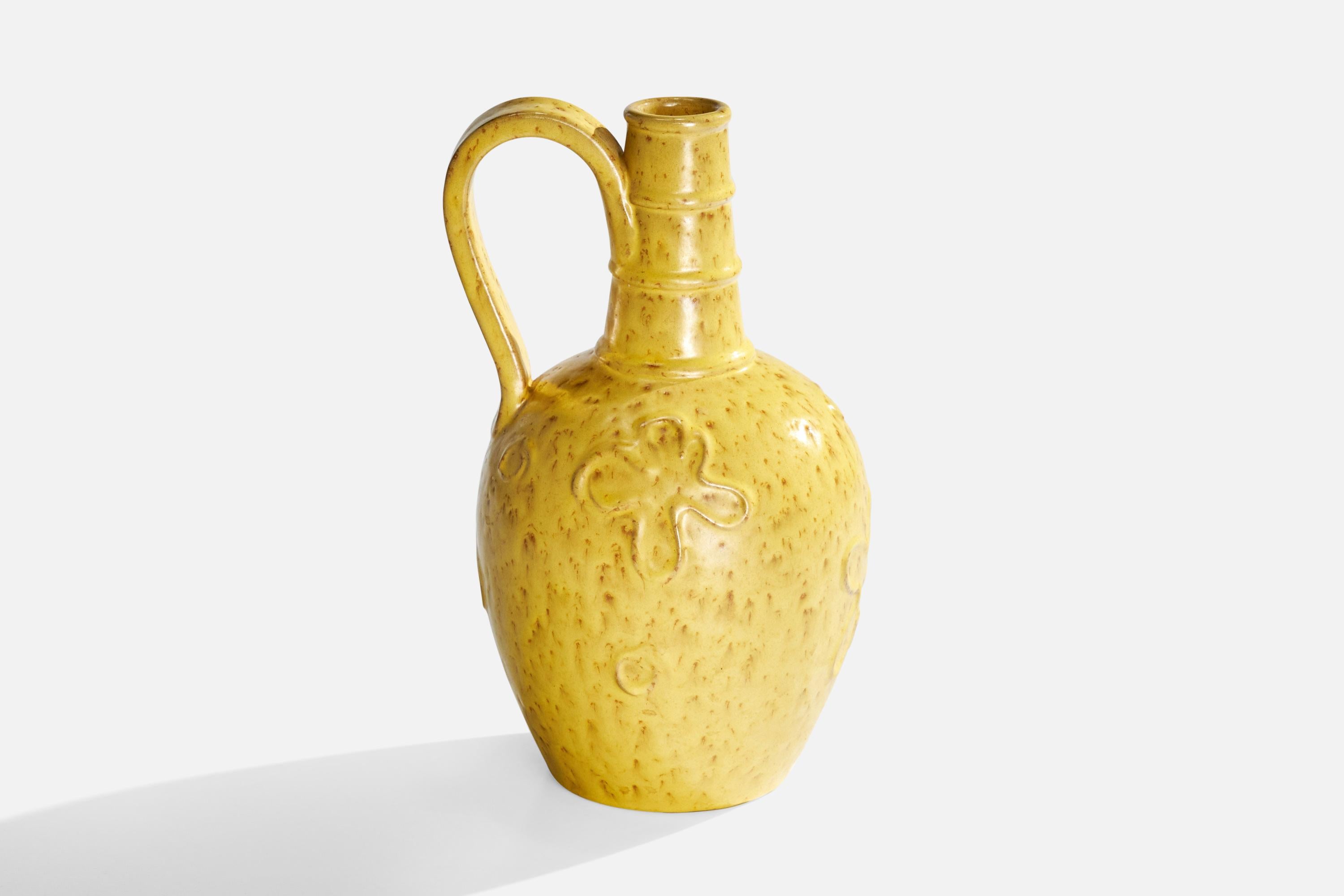 Vaso in ceramica smaltata gialla progettato e prodotto da Nittsjö, Svezia, anni '30 circa.

Dimensioni: 8,5