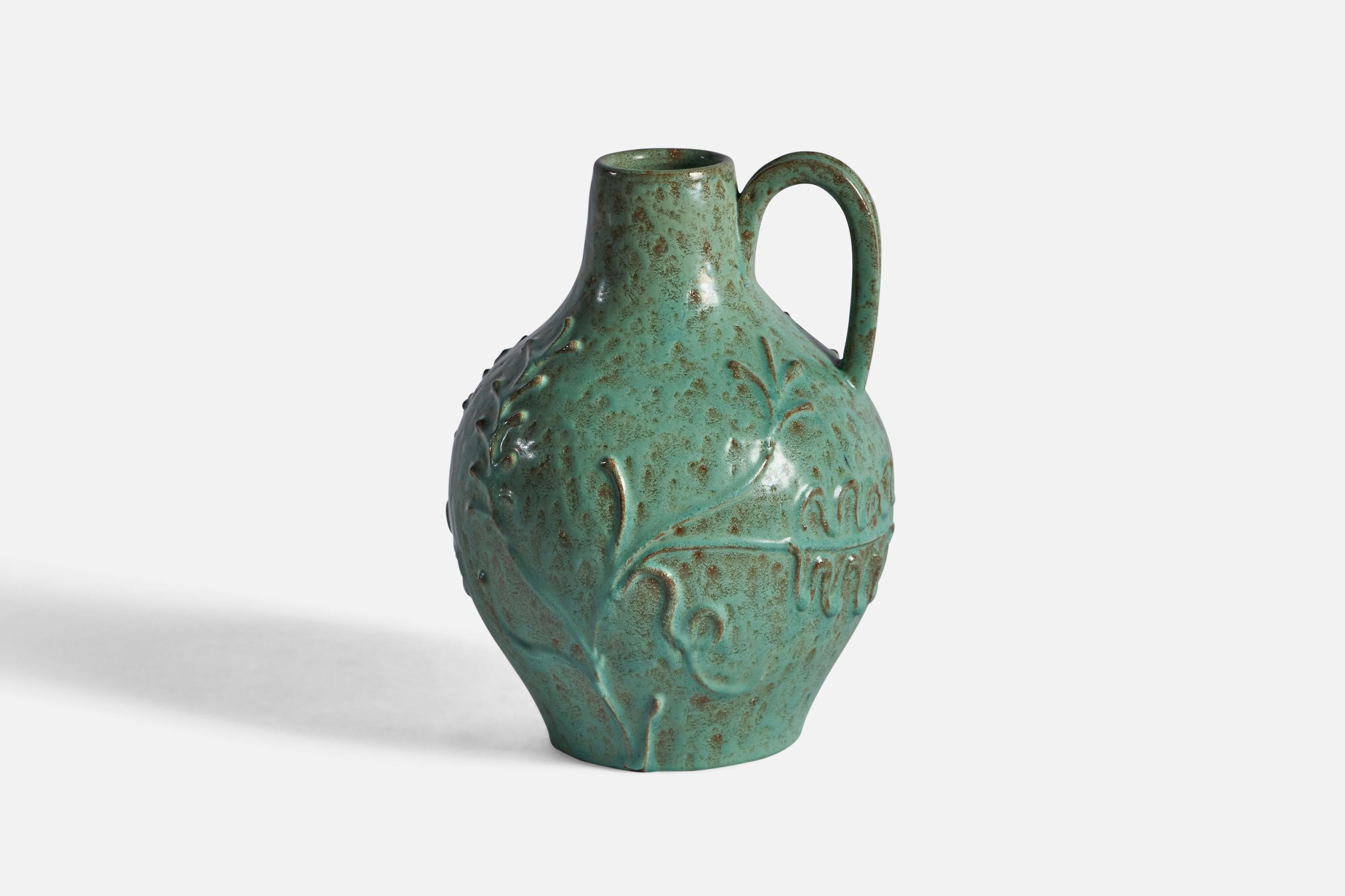 A green-glazed earthenware vase with relief decoration, designed and produced by Nittsjö, Sweden, c. 1930s.