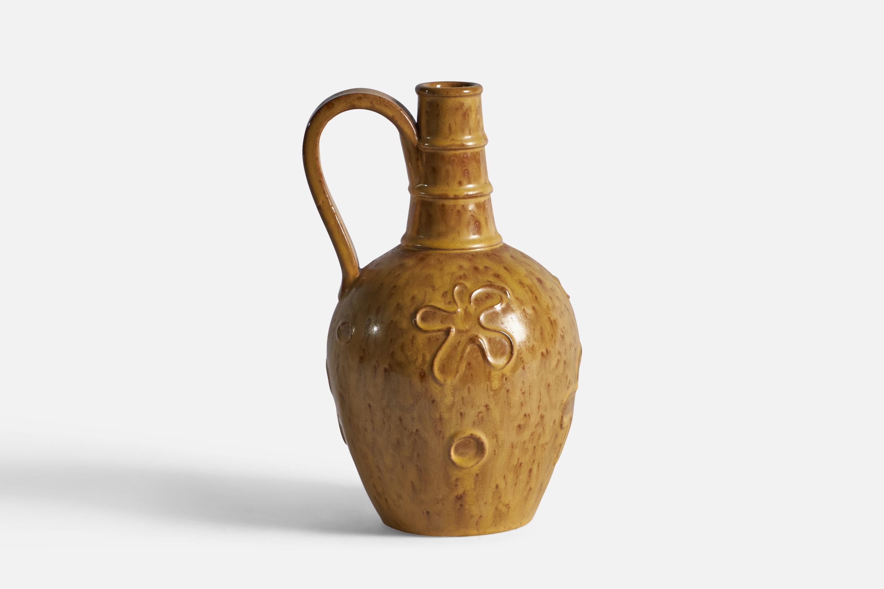 A yellow-glazed earthenware vase with relief decor, designed and produced by Nittsjö, c. 1940s.