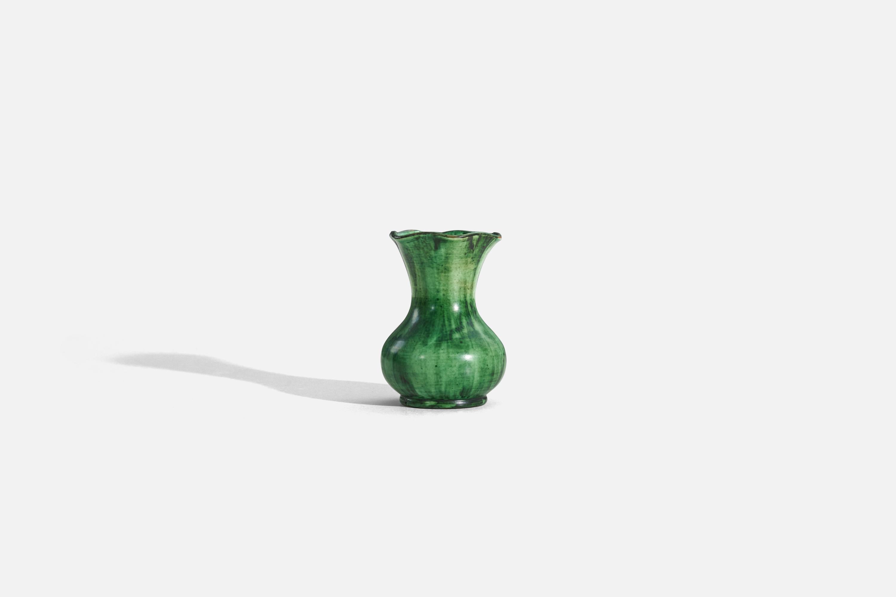 A green, glazed earthenware vase designed and produced by Nittsjö, Sweden, c. 1940s. 

