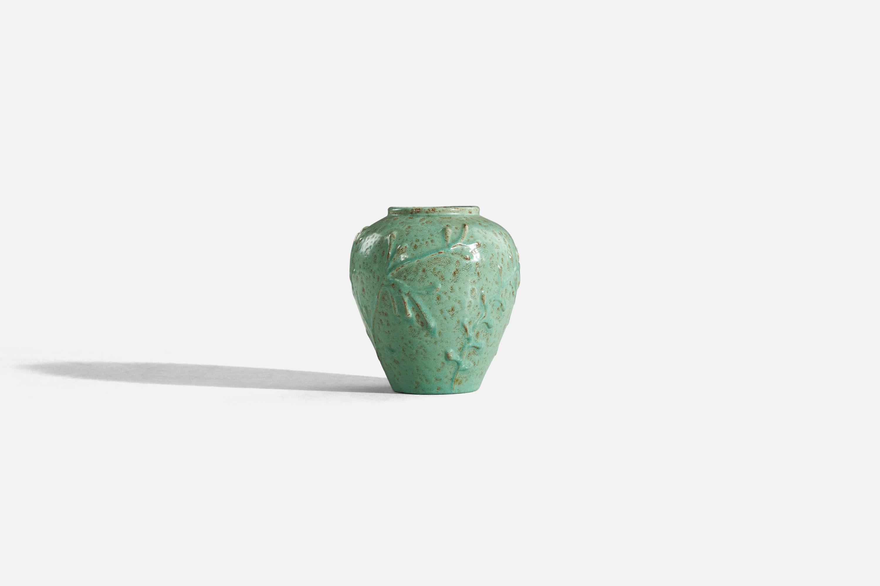 A green-glazed earthenware vase designed and produced by Nittsjö, Sweden, 1940s. 
 