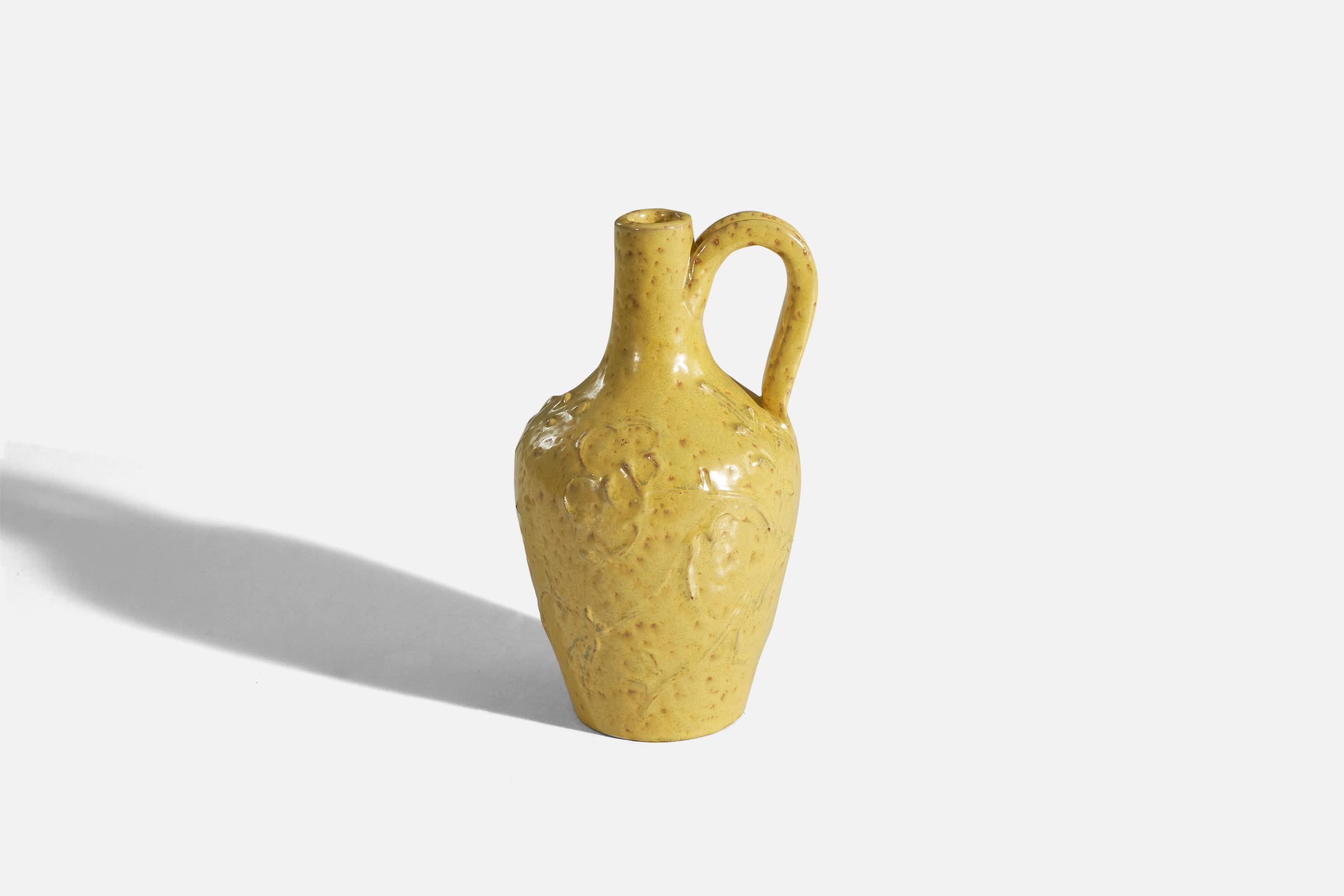 A yellow, glazed earthenware vase designed and produced by Nittsjö, Sweden, 1940s.
 