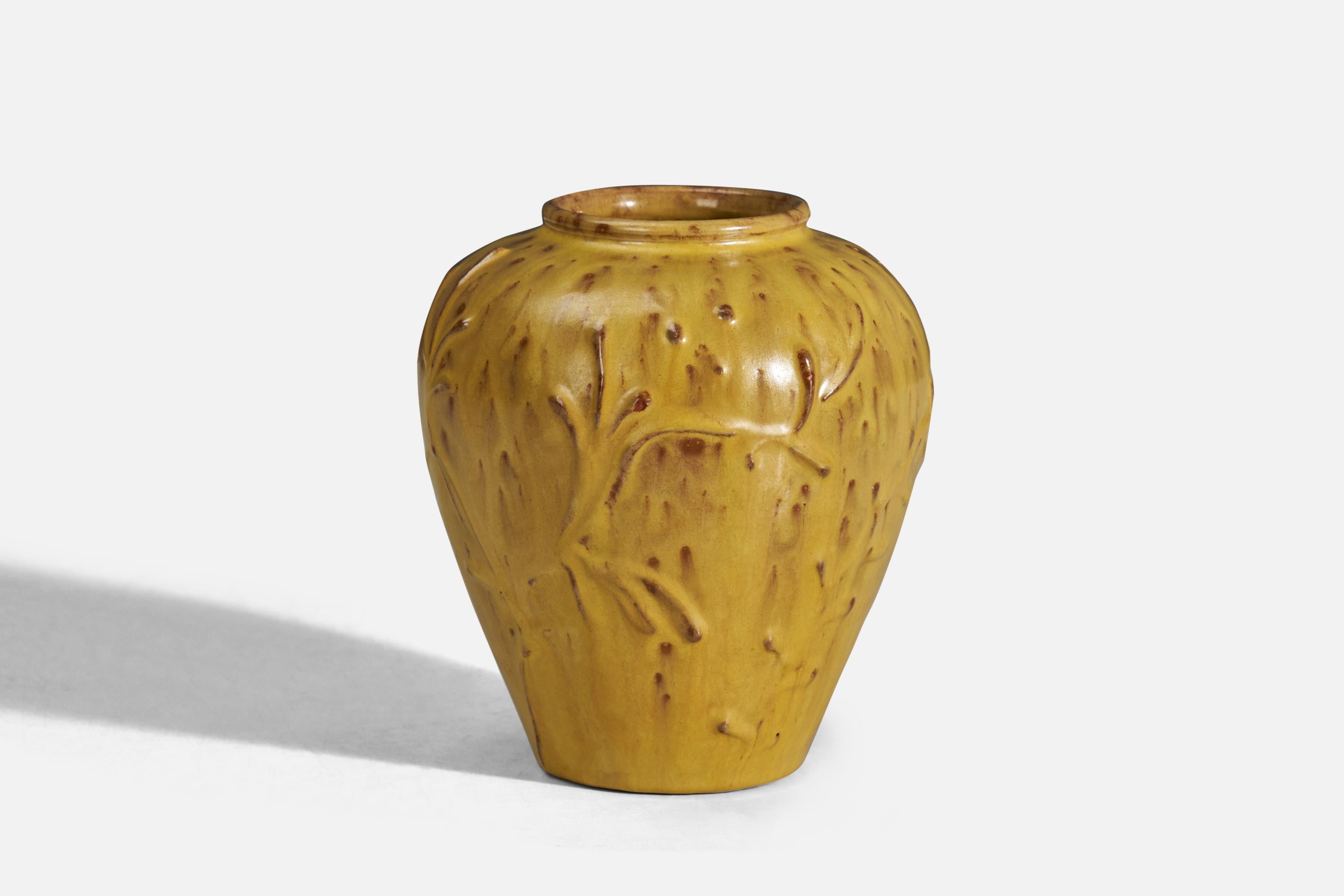 A yellow glazed earthenware vase designed and produced by Nittsjö, Sweden, 1940s.