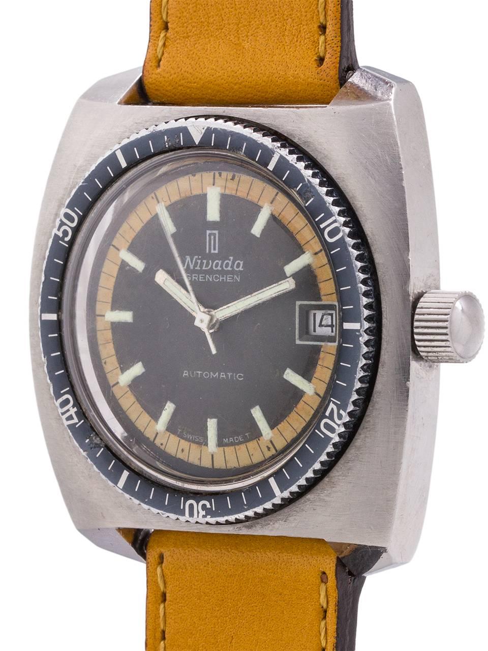 
Great looking Nivada Grenchen diver’s model circa 1960’s. Featuring a 39 x 42mm cushion shaped case with raised elapsed time bezel, and acrylic dome crystal. With original black dial with aged yellow minute track and tritium indexes and silver