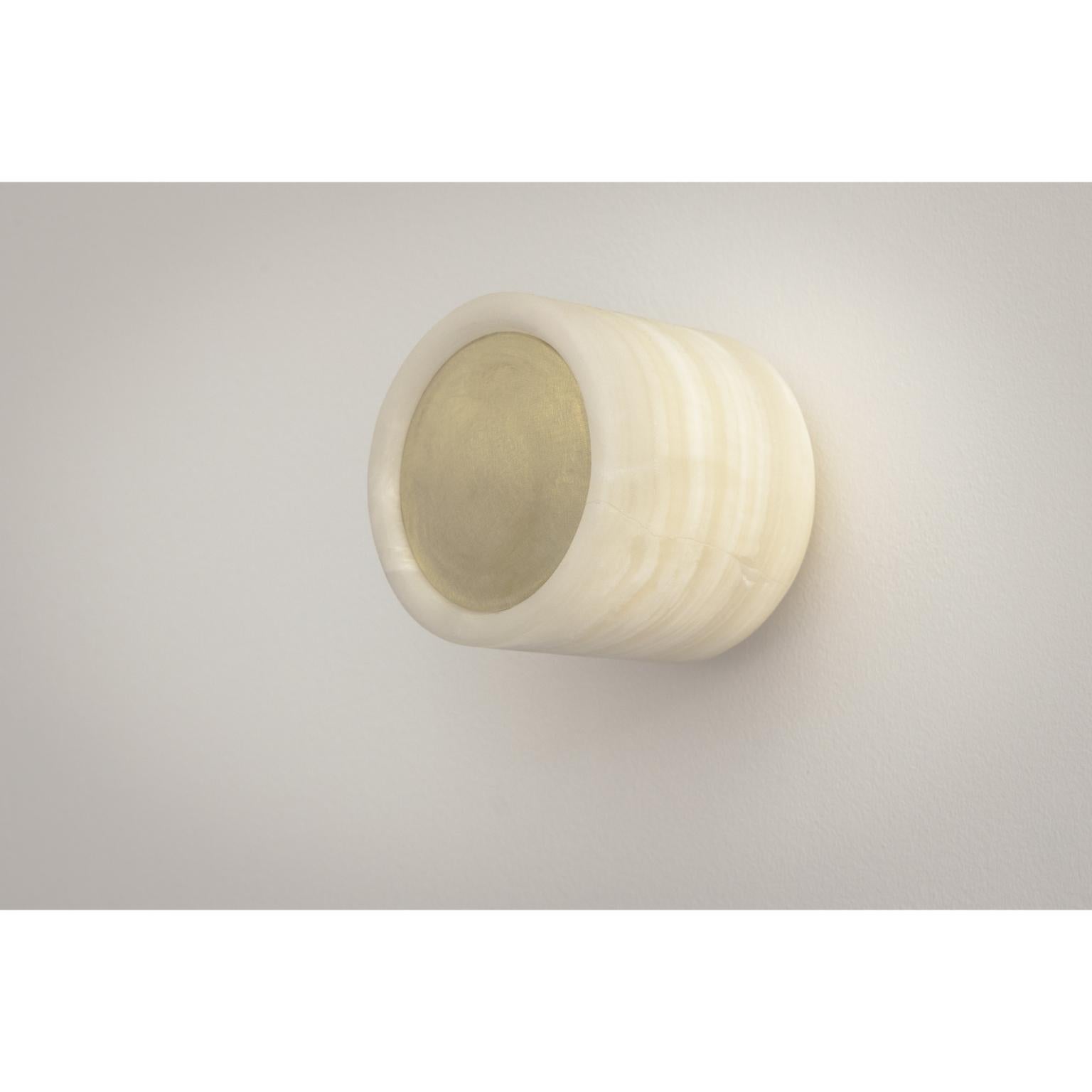 Nix Wall Sconce in Brushed Brass & Onyx by Nuumbra
Dimensions: Ø 10 x H 10 cm. 
Materials: Brushed brass and onyx.

Available in brushed or aged brass. Prices may vary. All our lamps can be wired according to each country. If sold to the USA it will