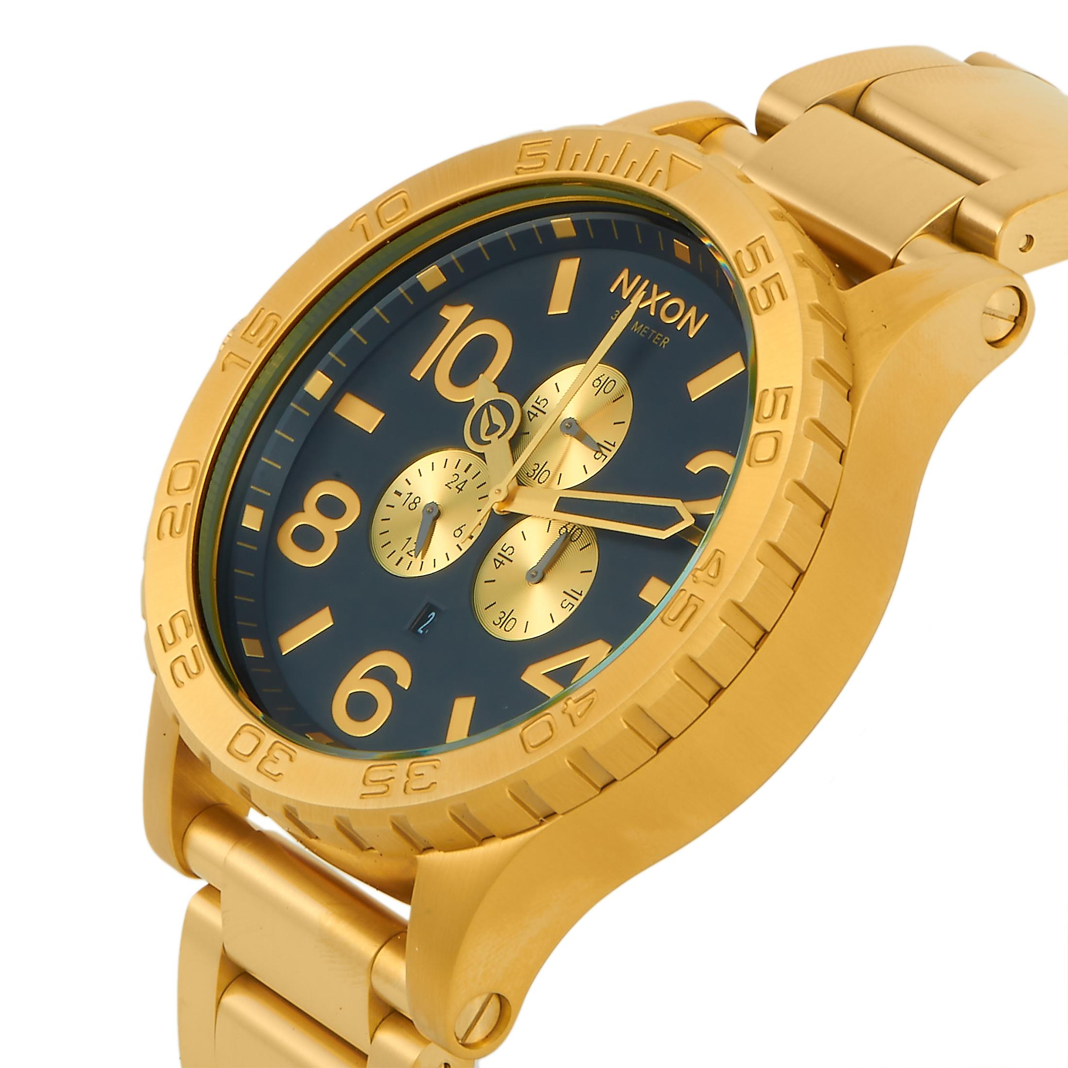 The Nixon 51-30 Chrono All Gold/Black watch, reference number A083-510-00, comes with a 51 mm gold-tone stainless steel case that is fitted with a unidirectional rotating bezel. The case is presented on a matching gold-tone stainless steel bracelet.