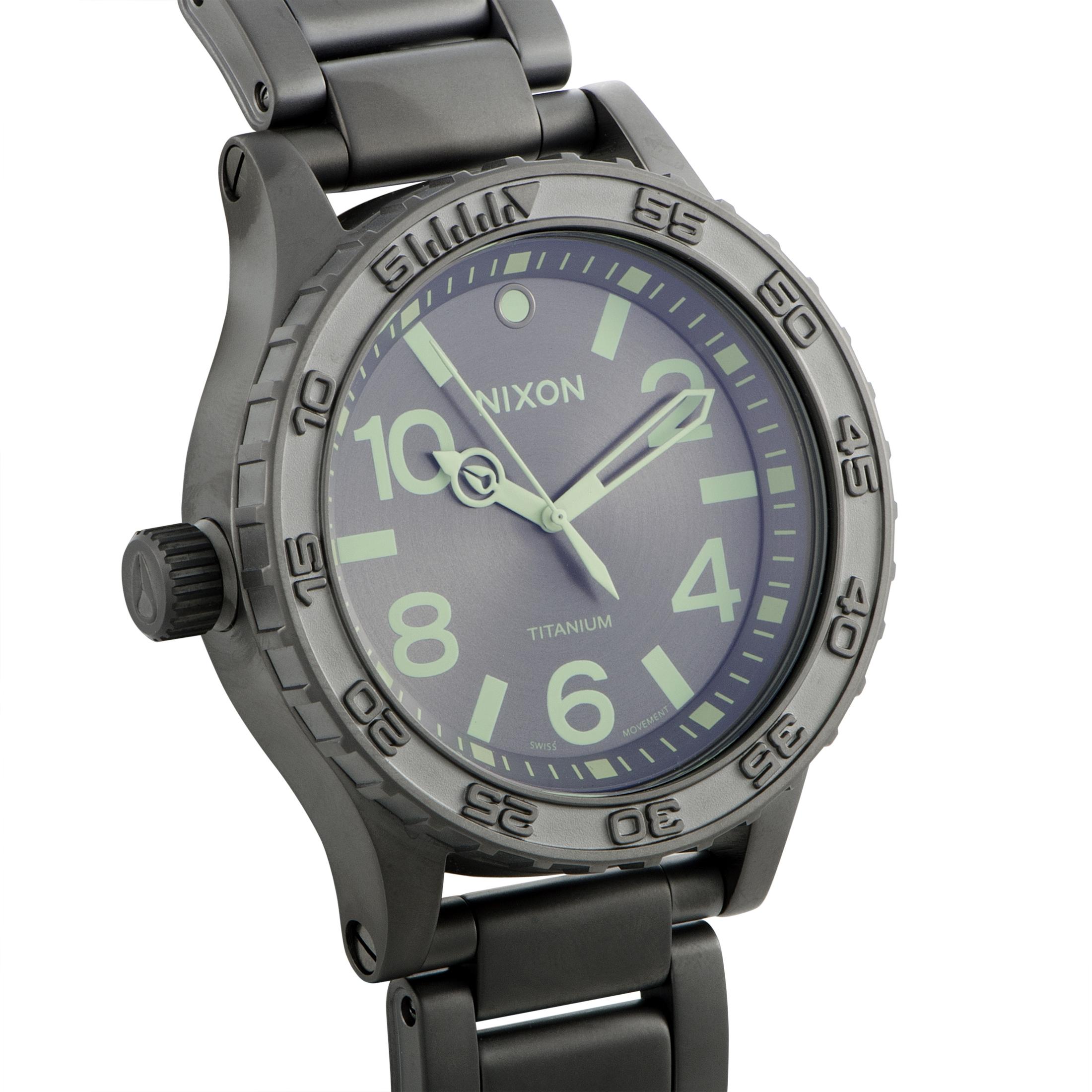 The Nixon 51-30 Titanium boasts a 51 mm case made of titanium that is presented on a matching titanium bracelet. The gray dial with Arabic numerals features central hours, minutes and seconds. The watch is powered by a quartz movement and offers