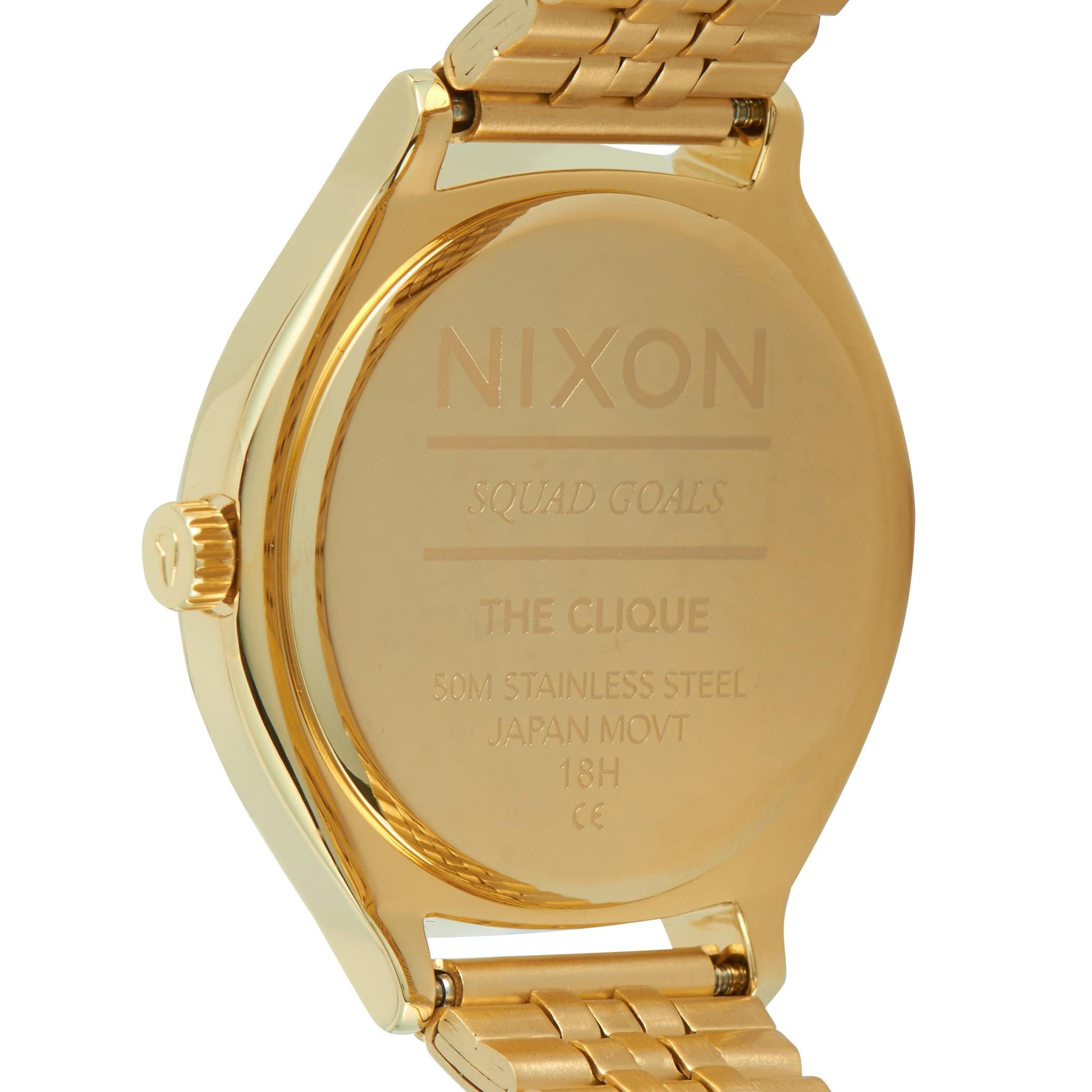 gold nixon watches