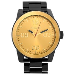 Nixon Corporal Montre noire/dorée en acier inoxydable A346-010-00