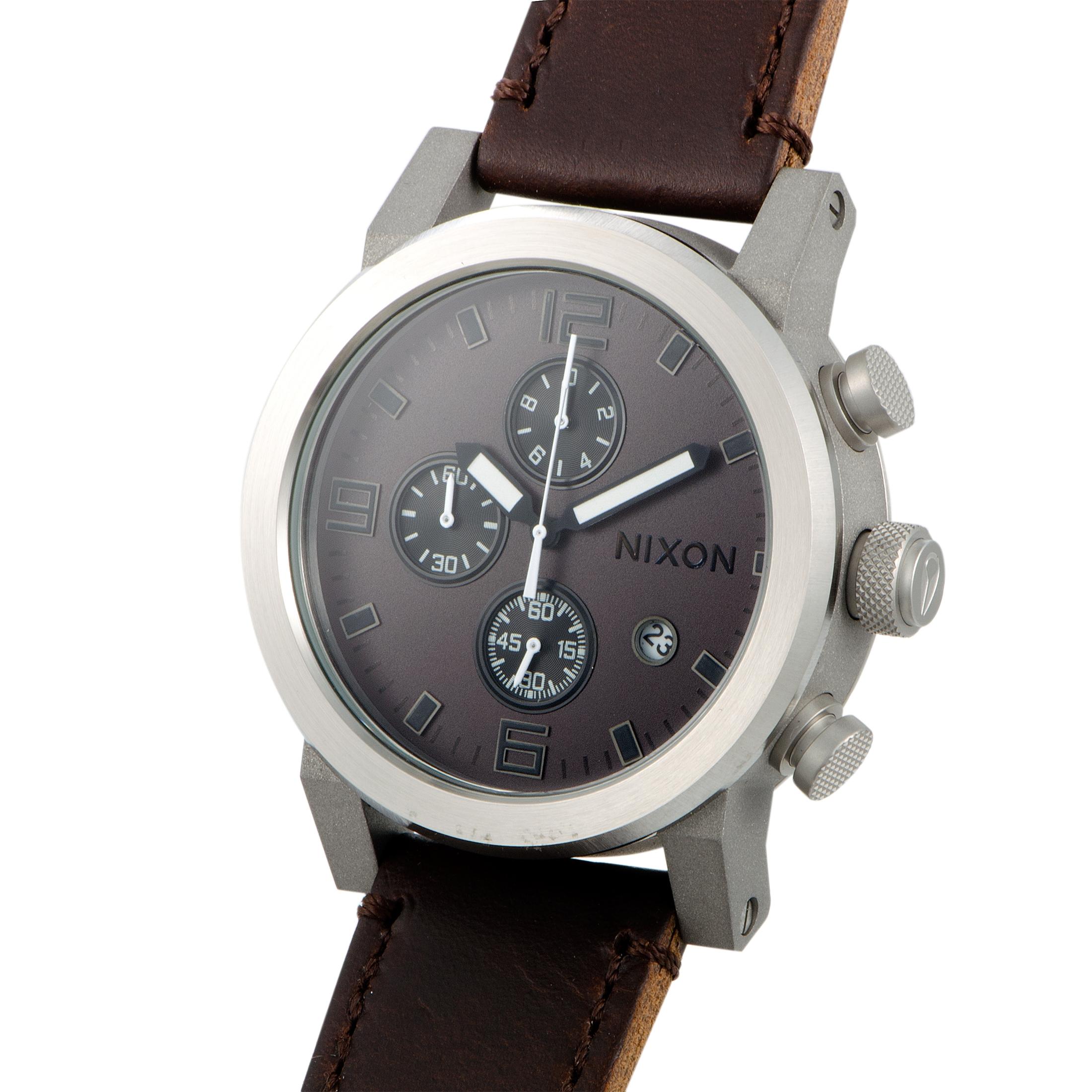 This is the Ride watch by Nixon, reference number A315-562-00.

Presented with a stainless steel case that is mounted onto a brown leather strap fitted with a tang buckle, this model offers water resistance of 100 meters. The brown dial with Arabic