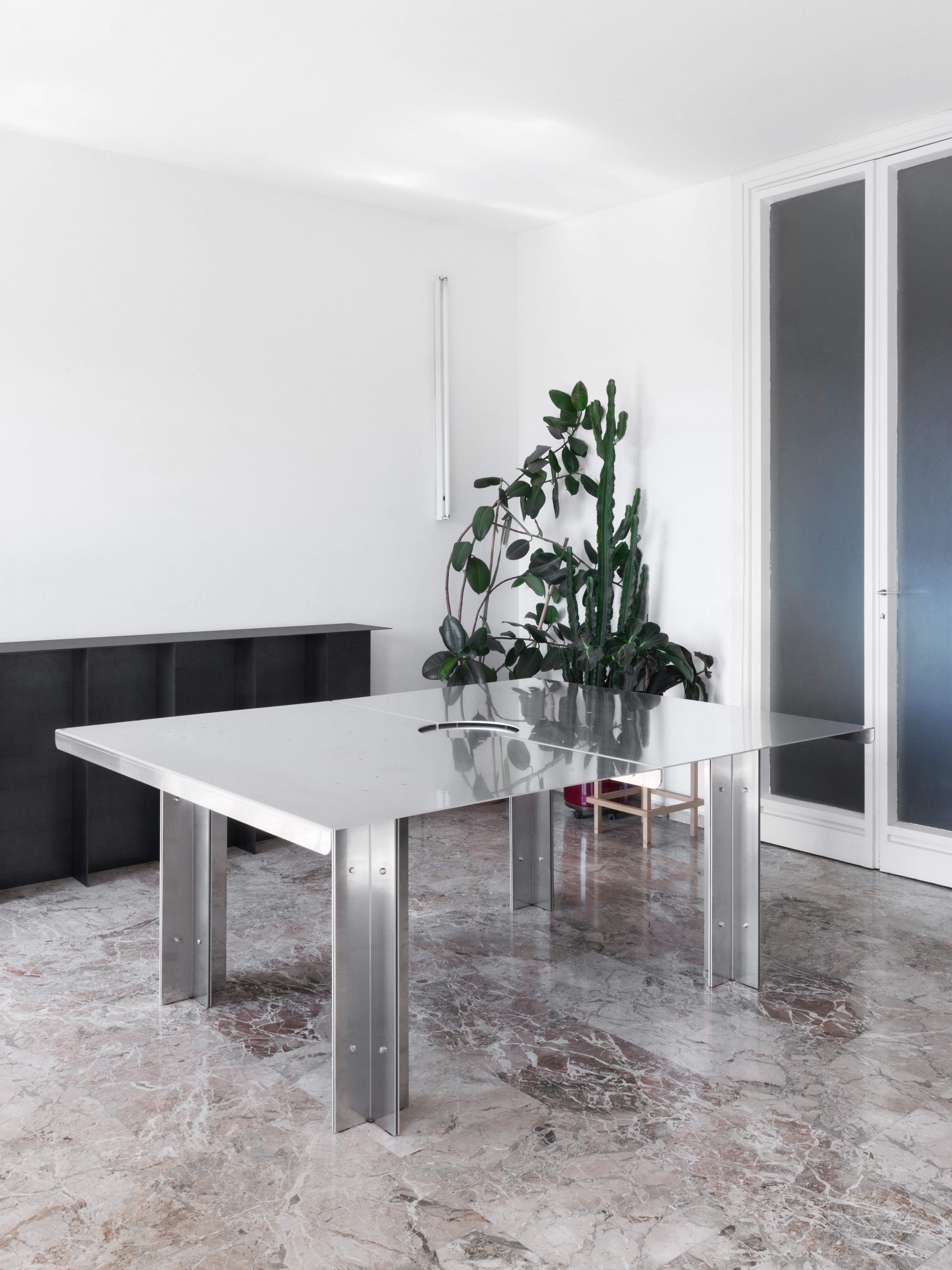 NMFD dining table by NM3
Dimensions: W 150 x D 190 x H 75 cm
Materials: raw aluminum

4mm to 10mm folded raw aluminum and dry joint dining table.

NM3 is an office for architecture and design based in Milan run by Nicolò Ornaghi, Delfino Sisto