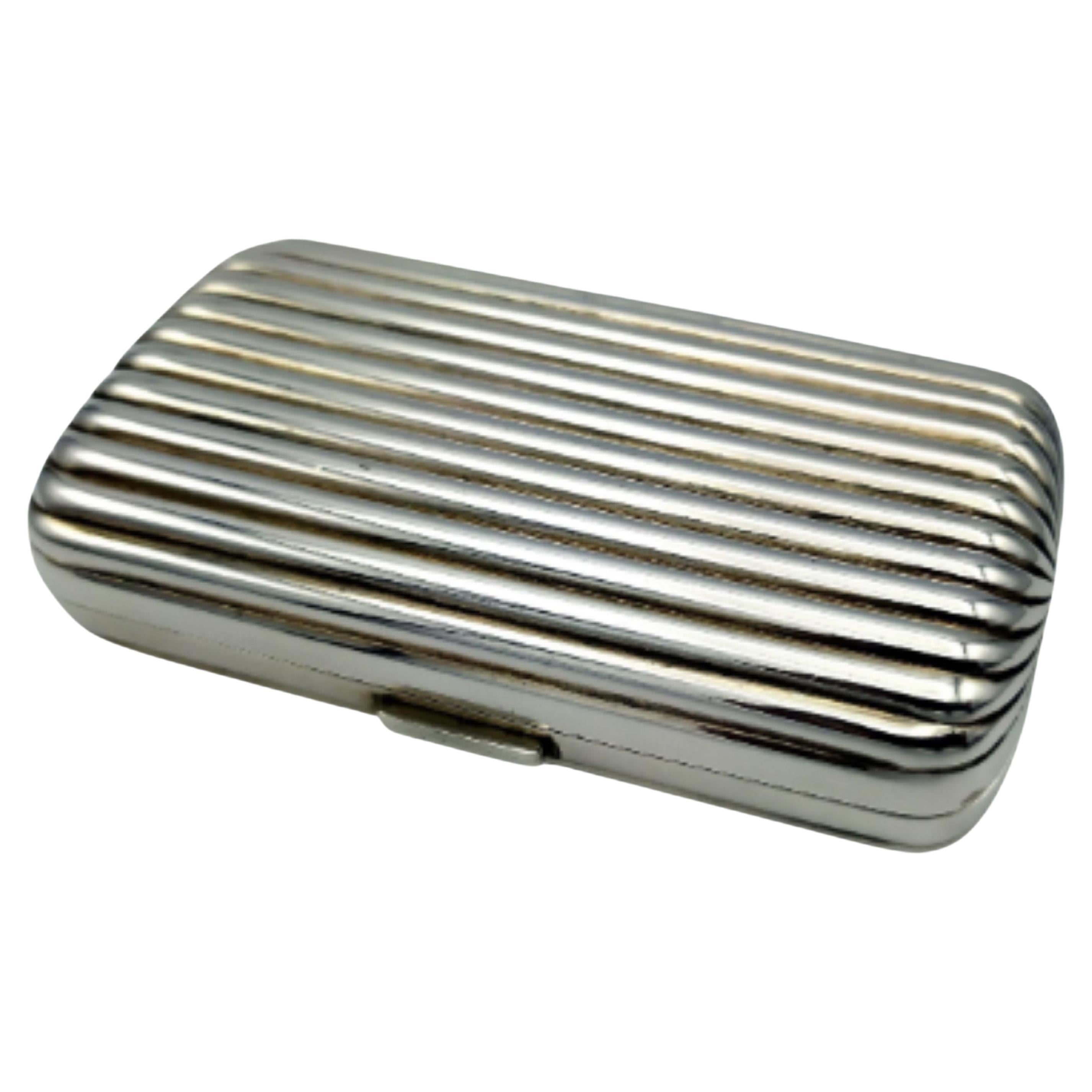 Salimbeni  Striped Cigarette Case, oval section Sterling Silver natural. For Sale
