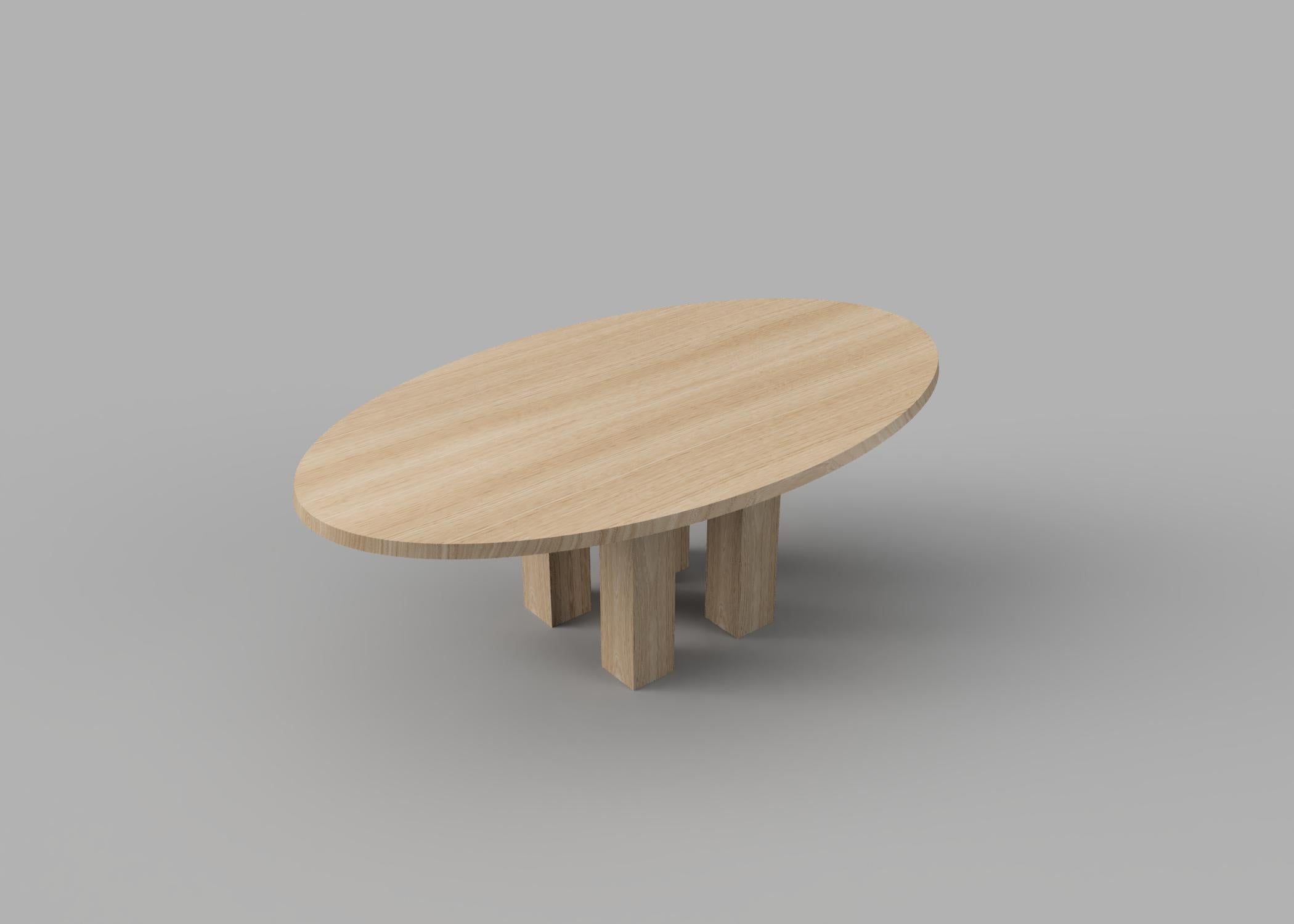 Custom oval table.

This piece quietly challenges the archetype of a table with the unexpected proportion of the legs and hidden detailing. A single plane effortlessly floats atop four oversized wood legs.

Beautifully crafted with high grade solid