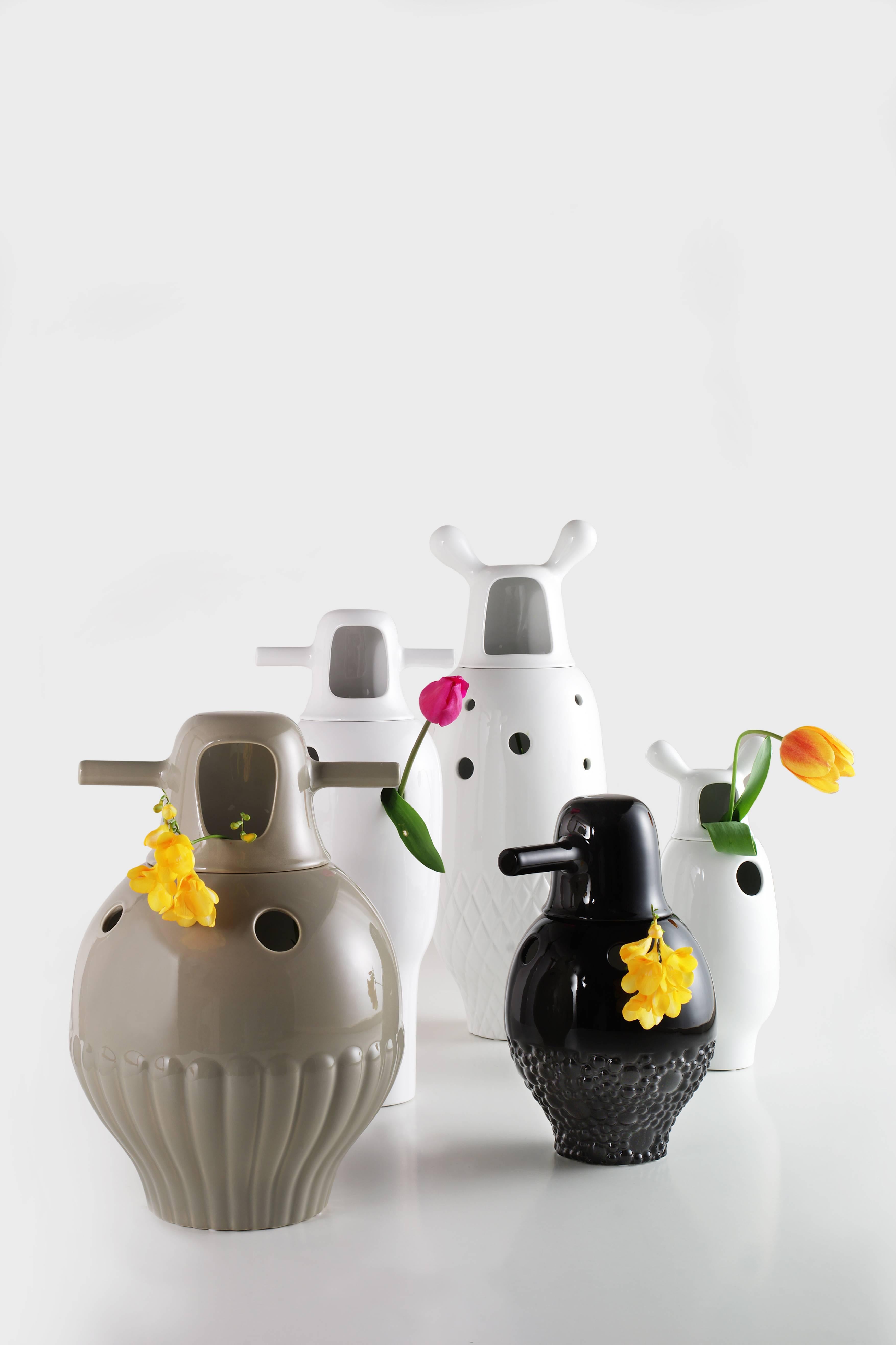 The Showtime Vases are just as current as when we launched them over 10 years ago. They are little decorative sculptures that fully reproduce Hayon’s universe.

Made of two glazed ceramic pieces. Bi-coloured vase (interior in white and exterior