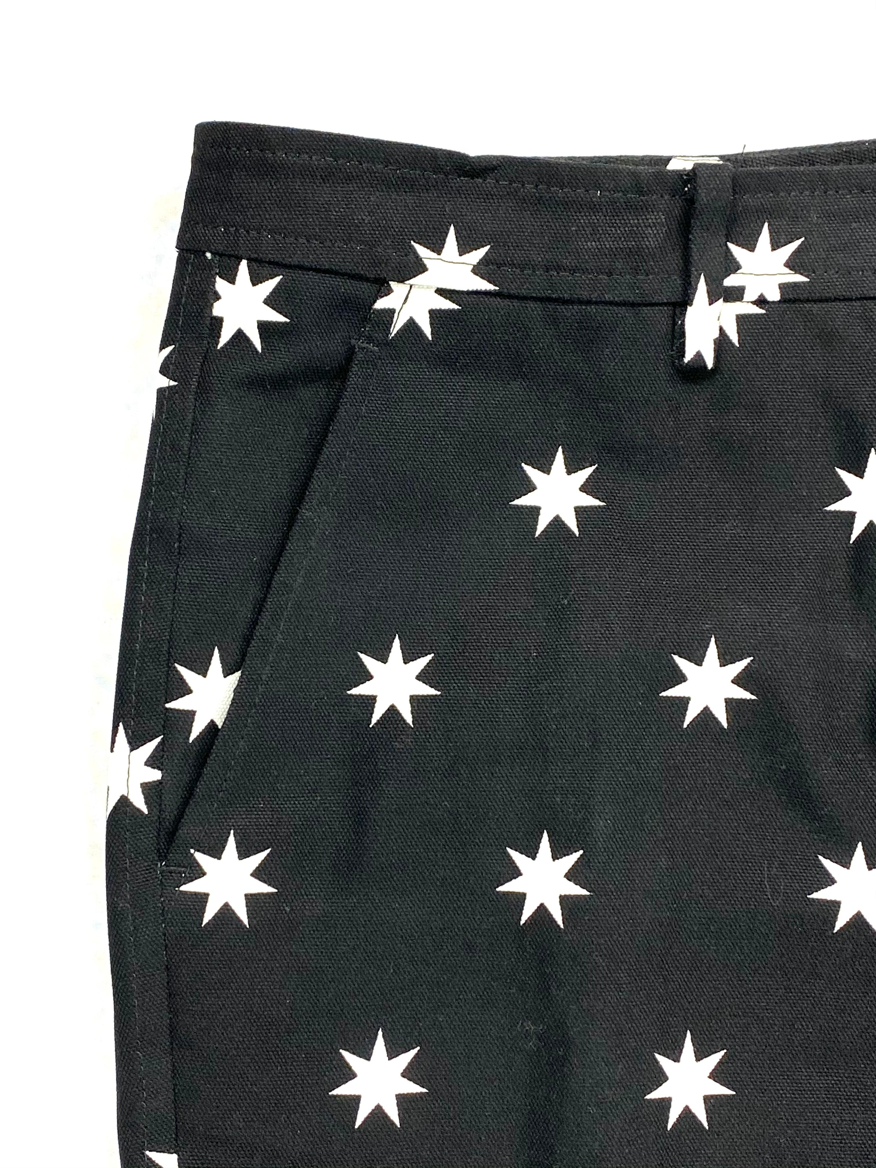 Product details:

Featuring cotton black trousers with white star pattern, straight fit, side pockets.