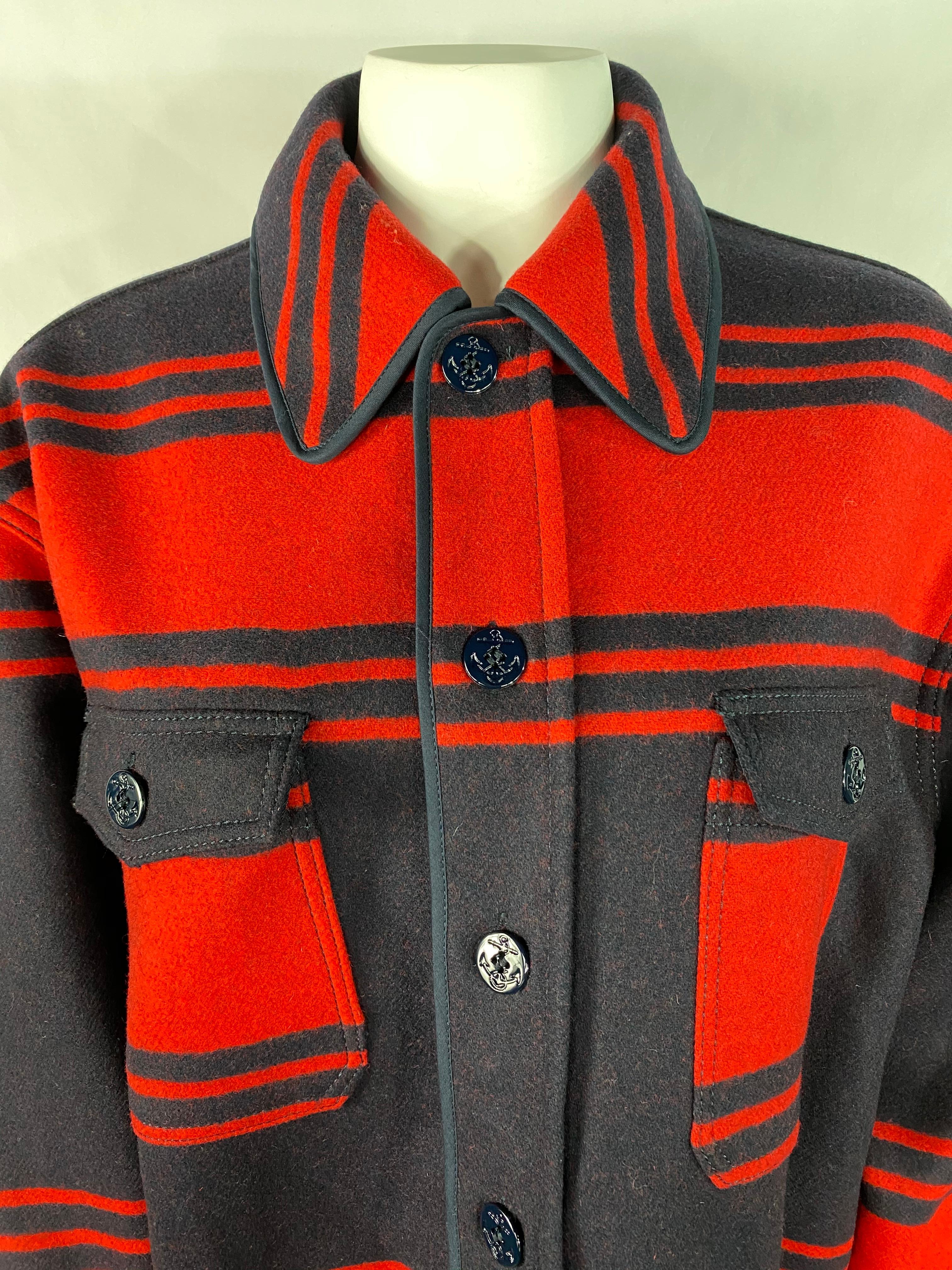 Product details:

Featuring navy and red wool striped pattern, front navy button down closure with collar and front dual pockets. The buttons designed with the anchor symbol.
Brand new, with tags.
Made in Italy.
