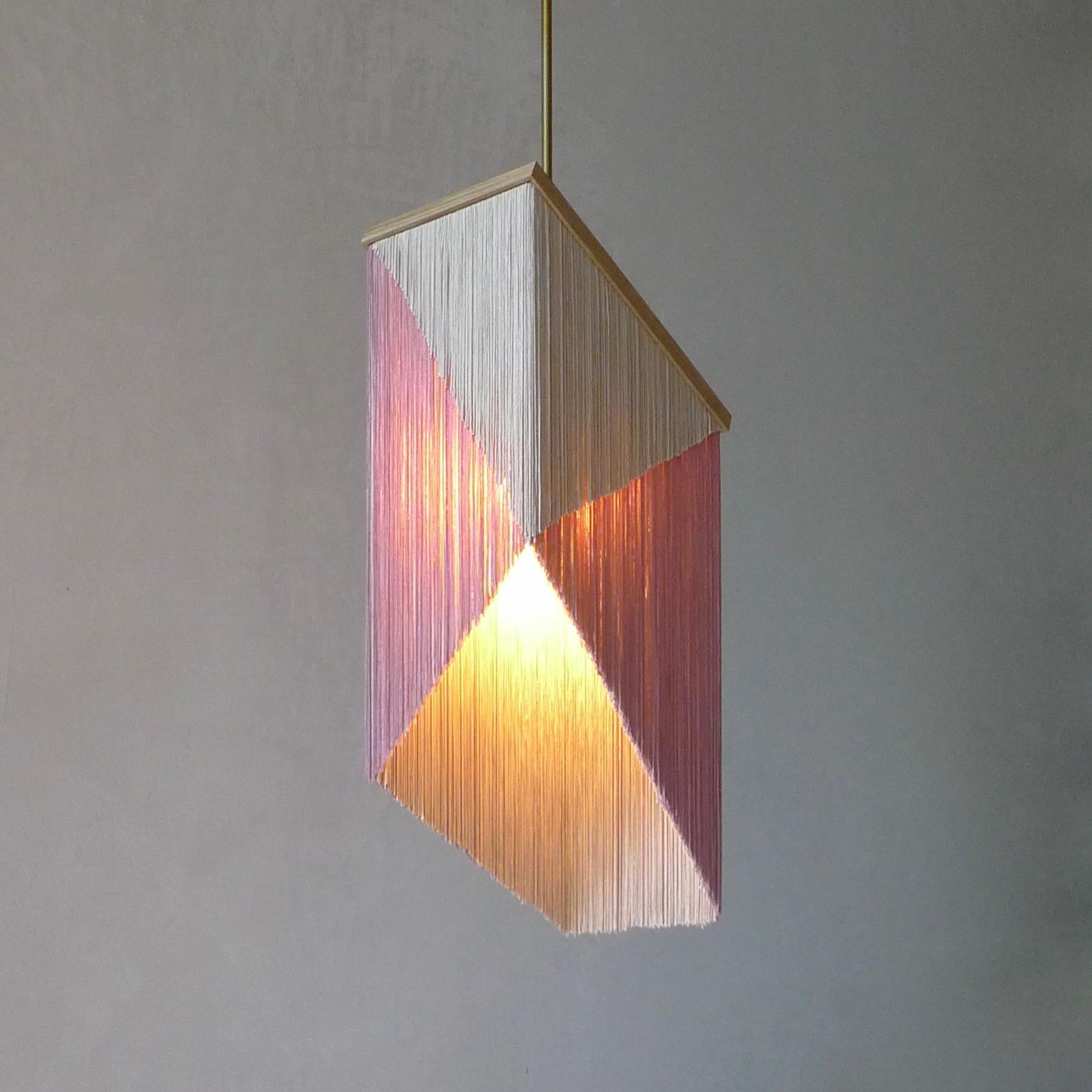 No. 26 pendant lamp by Sander Bottinga
Objet size 1
Dimensions: H 46 -71 x W 31 x D 17 cm
Materials: brass, wood, leather, Viscose Fringes
Variations available. 

Handmade in brass, wood, leather and 3 double layered viscose fringes