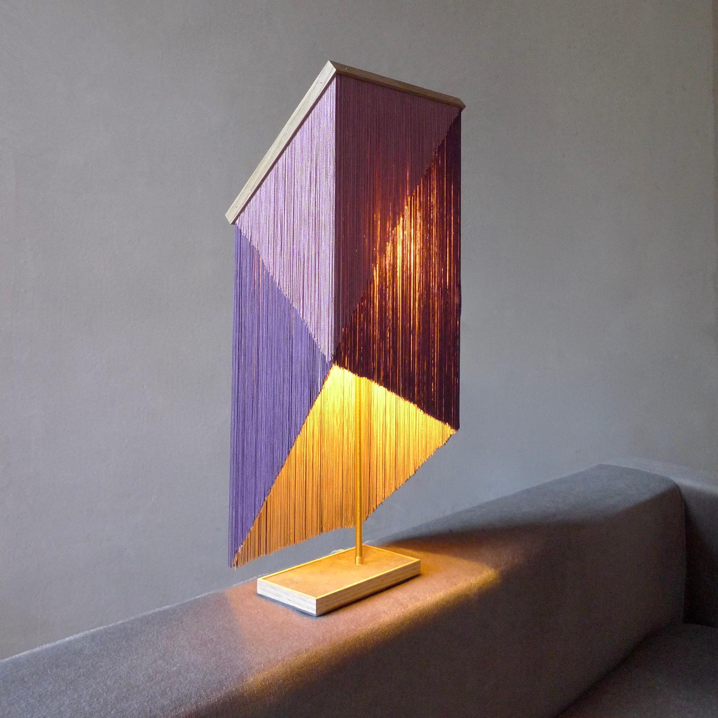 No. 29 Table Lamp by Sander Bottinga
Object size 2 
Dimensions: W 26 x D 26 x H 57 - 75 cm
Materials: Brass, Wood, Leather, Viscose Fringes
Variations available.

Handmade in brass, wood, leather and 3 double layered viscose fringes