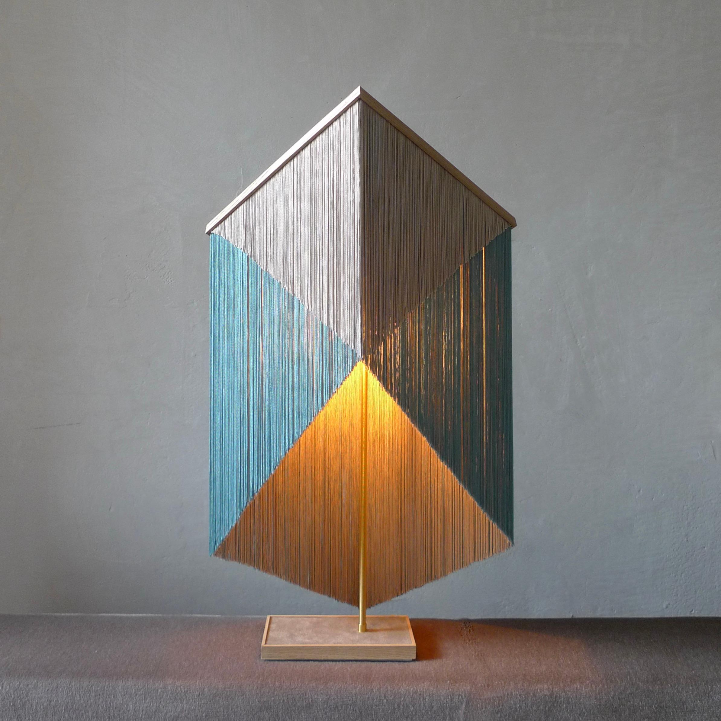 No. 29 table lamp by Sander Bottinga
Object size 3
Dimensions: W 31 x D 31 x H 57 - 75 cm
Materials: Brass, wood, leather, viscose fringes
Variations available. 

Handmade in brass, wood, leather and 3 double layered viscose fringes