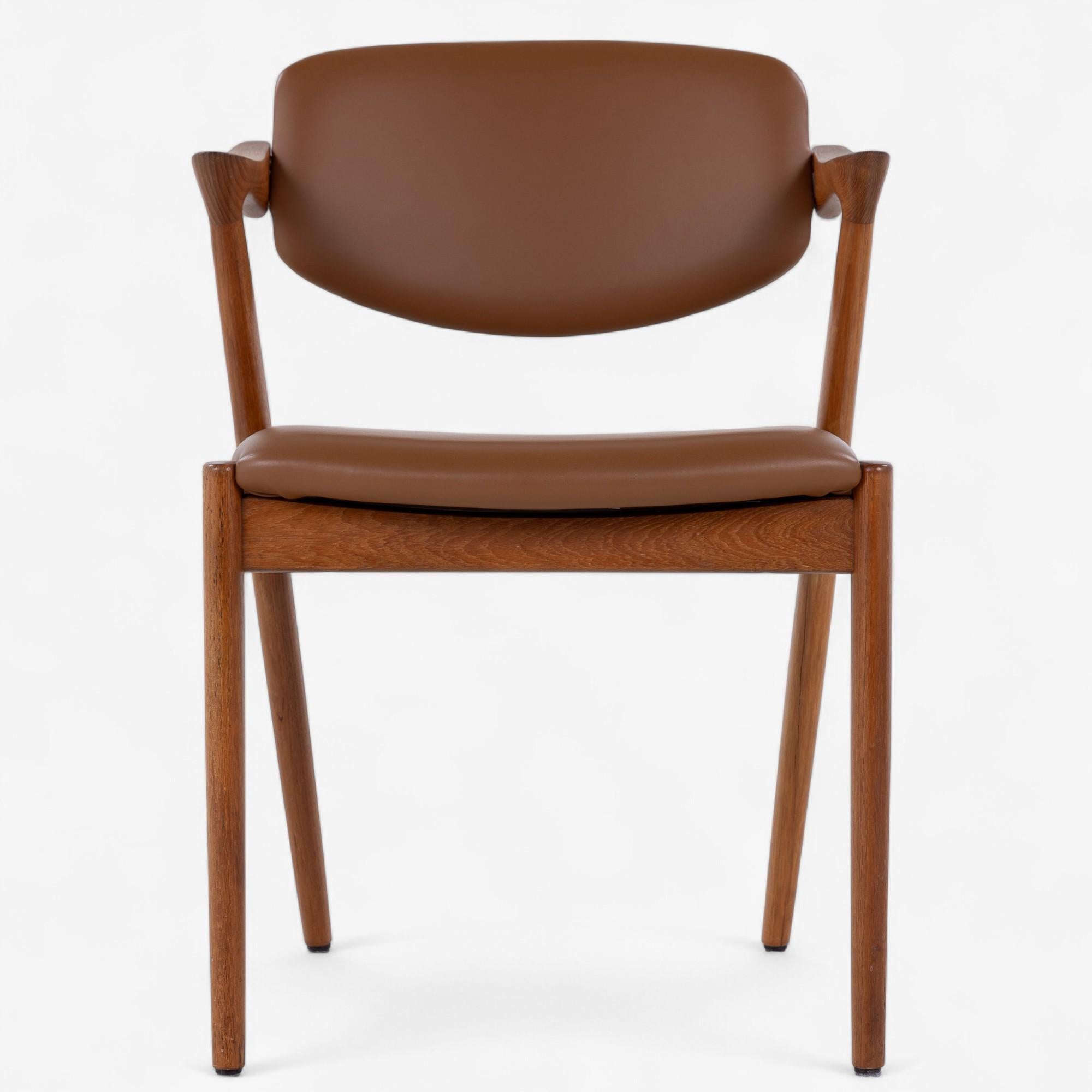 NO 42 - Set of 6 ‘Z-chairs’ armchairs in teak with seat and back upholstered in newer ‘Savanne’ semi-aniline leather (color: Walnut). Designed in 1956 by Niels O. Møller made by Schou Andersen Møbelfabrik.
