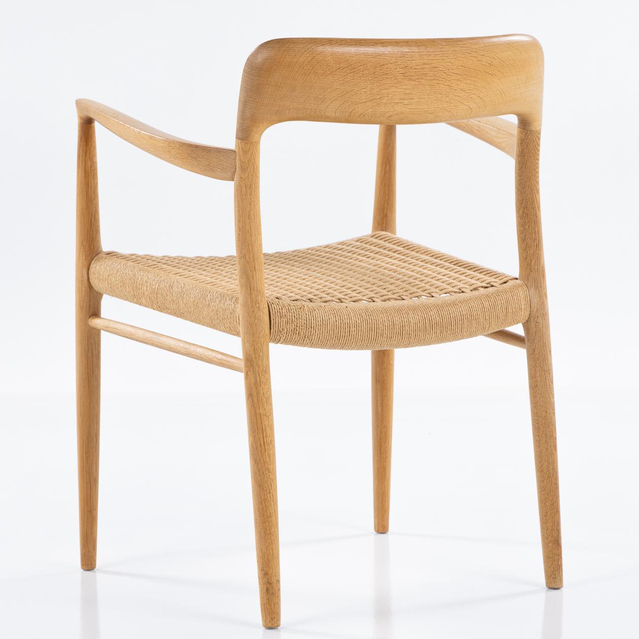 NO 56 - Armchair in oak with seat in patinated papercord. Niels O. Møller / J. L Møller.
