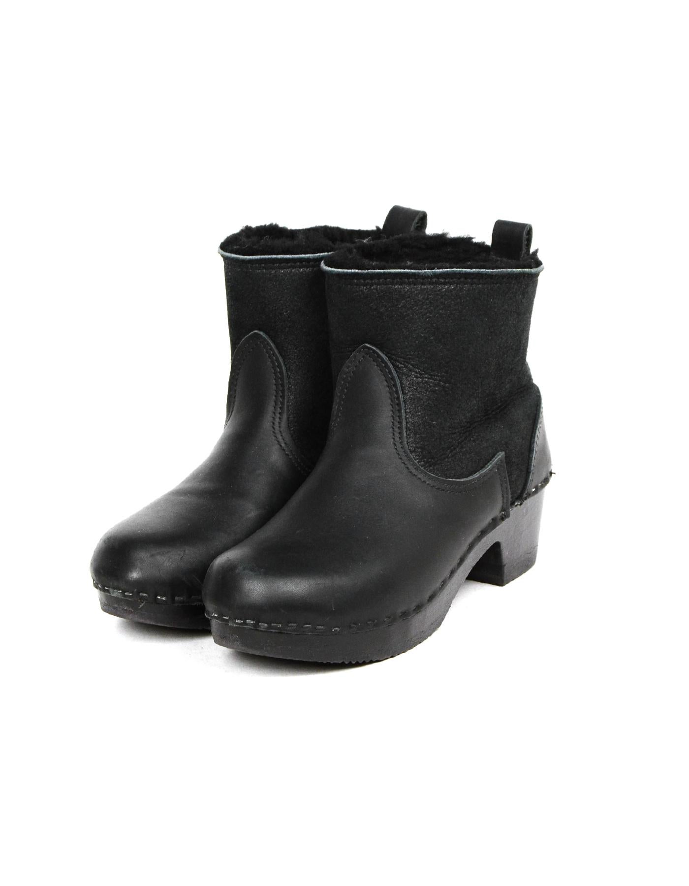 NO. 6 Black Leather/Suede Shearling-Lined Heeled Ankle Boots Sz 40

Color: Black
Materials: Leather, suede, shearling
Closure/Opening: Slide on
Overall Condition: Excellent pre-owned condition with exception of minor scratching in heel and at