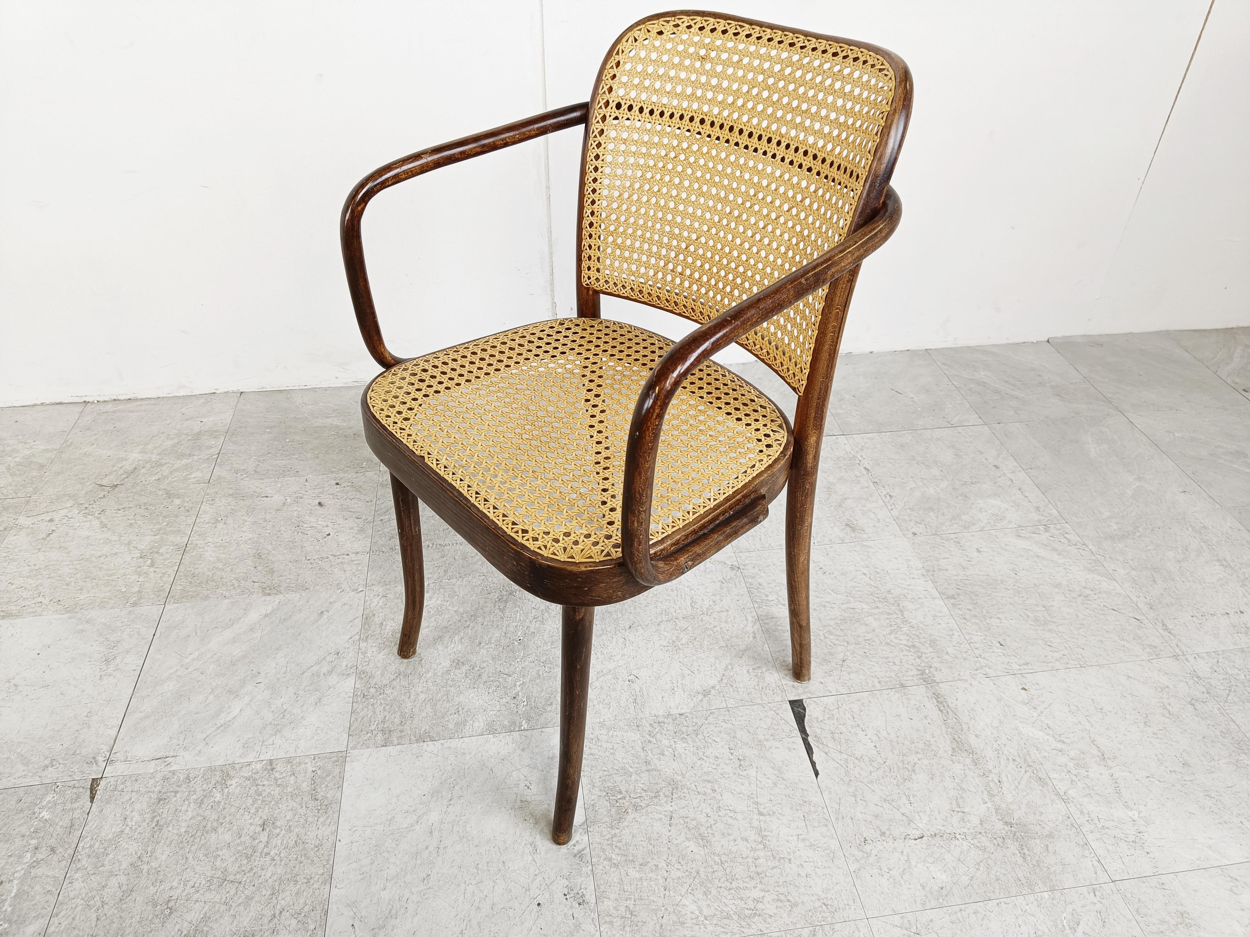 Set of 4 bentwood and cane webbing dining chairs designed by Jozef Hoffman for Thonet and produced by Ligna from the 1970s in the czech republic. 

Beautiful and elegant armchairs in good condition.

Good condition

1970s - Czech