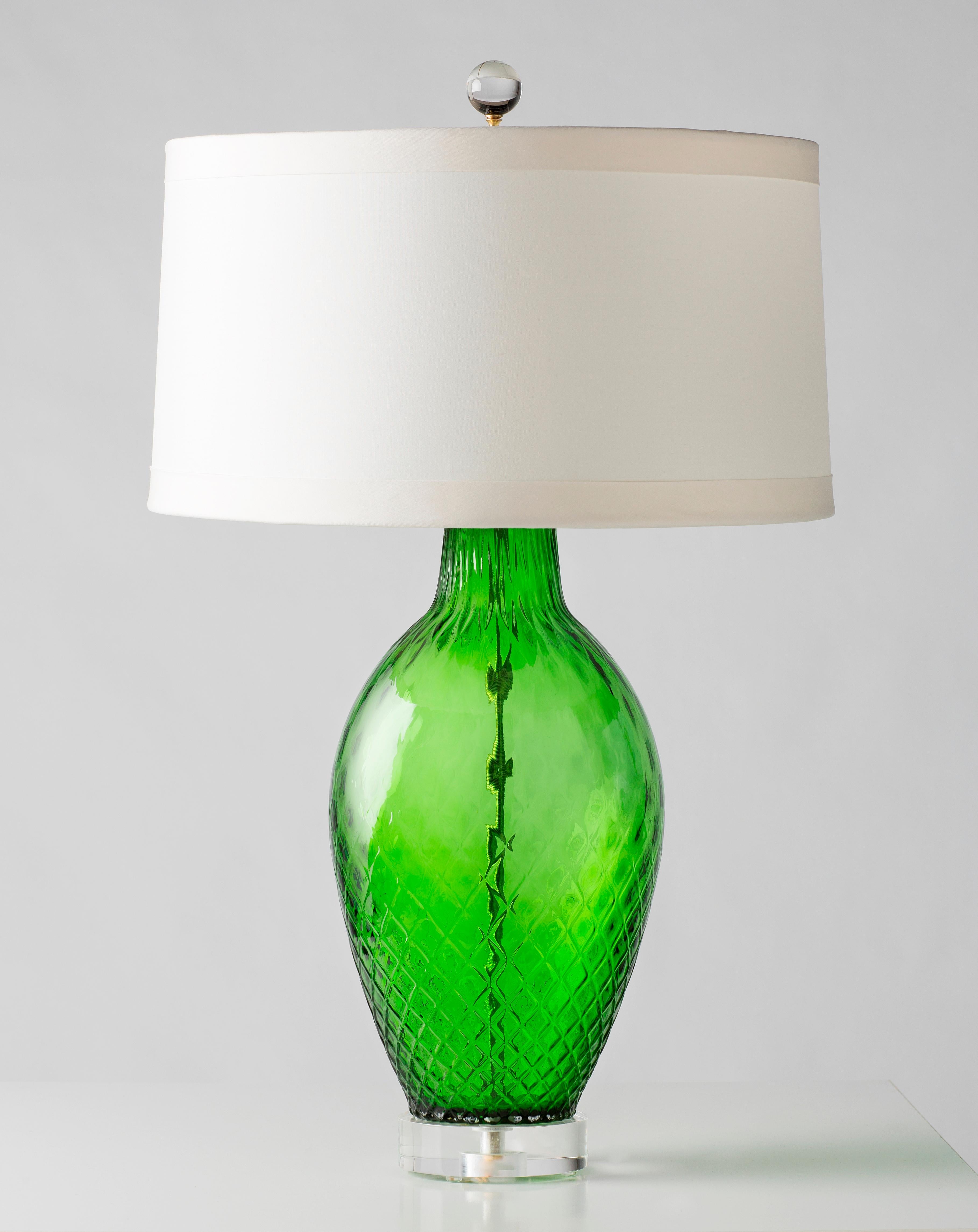 Ivory lacquer shade with gold foil interior, gold twisted cording, brass hardware and Lucite base. Three-way socket 50/100/150 watt.

This Murano lamp is handblown glass therefore overall dimensions, shape, color, and/or inclusions may slightly