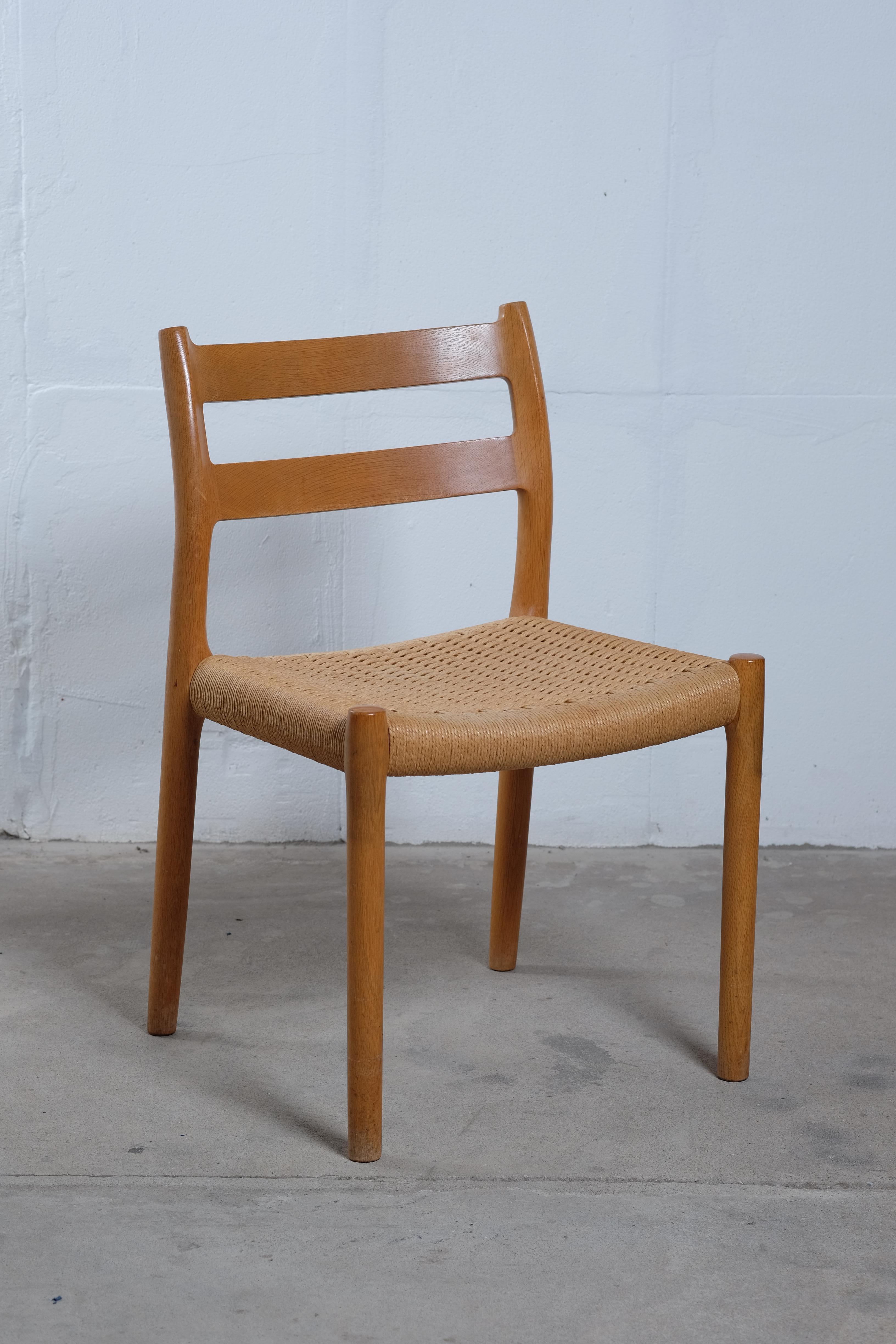 Danish No. 84 Oak Dining Chairs with Paper Cord Seats by Niels Otto Møller For Sale