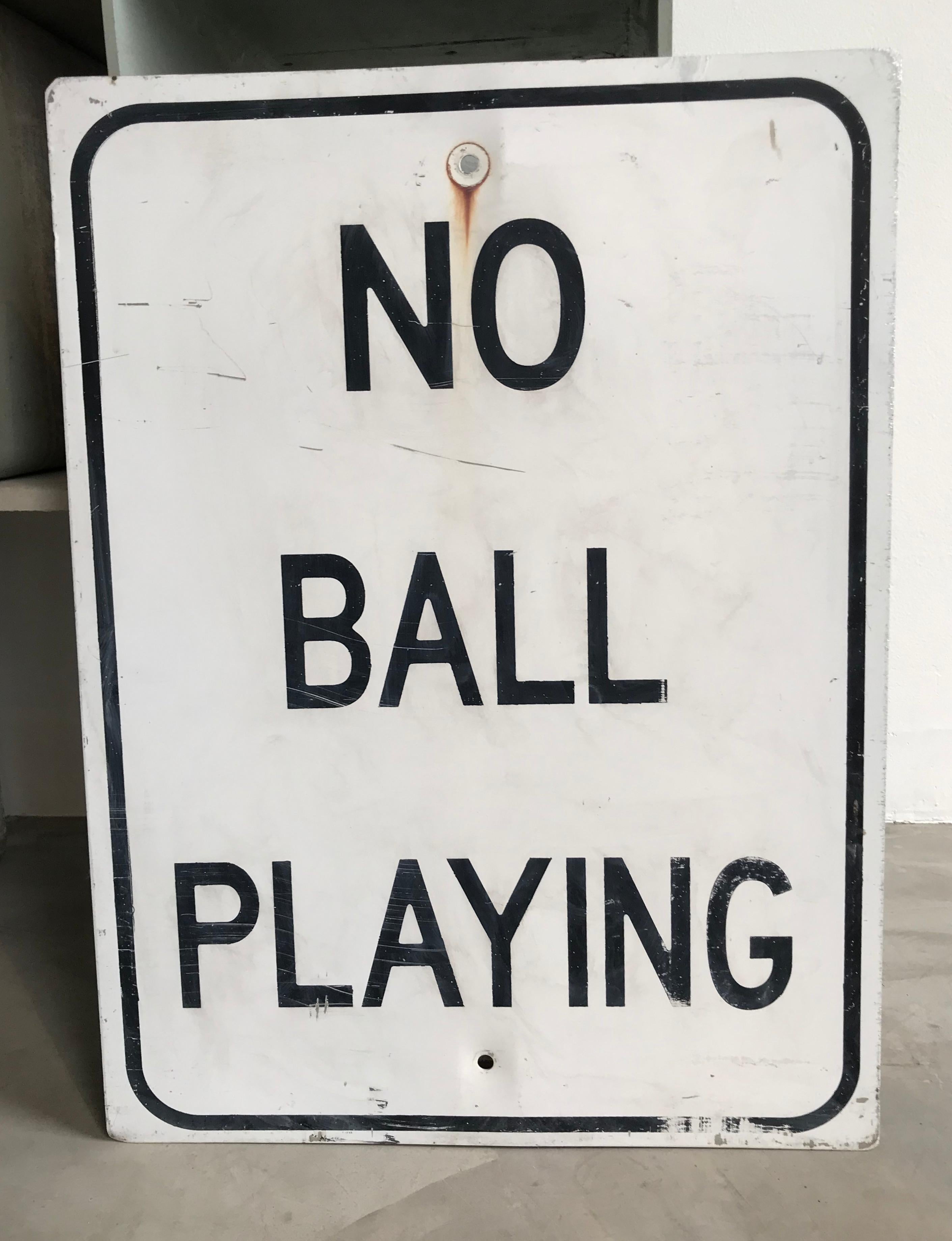 Great vintage neighborhood park sign that reads No Ball Playing. White sign with black lettering and trim. Fun piece for a rec room or kids room.