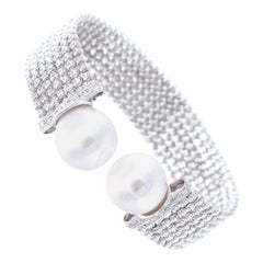Easy-to-Wear Spring Open Bangle in 18K Gold w/ Diamonds 
White South Sea Pearls