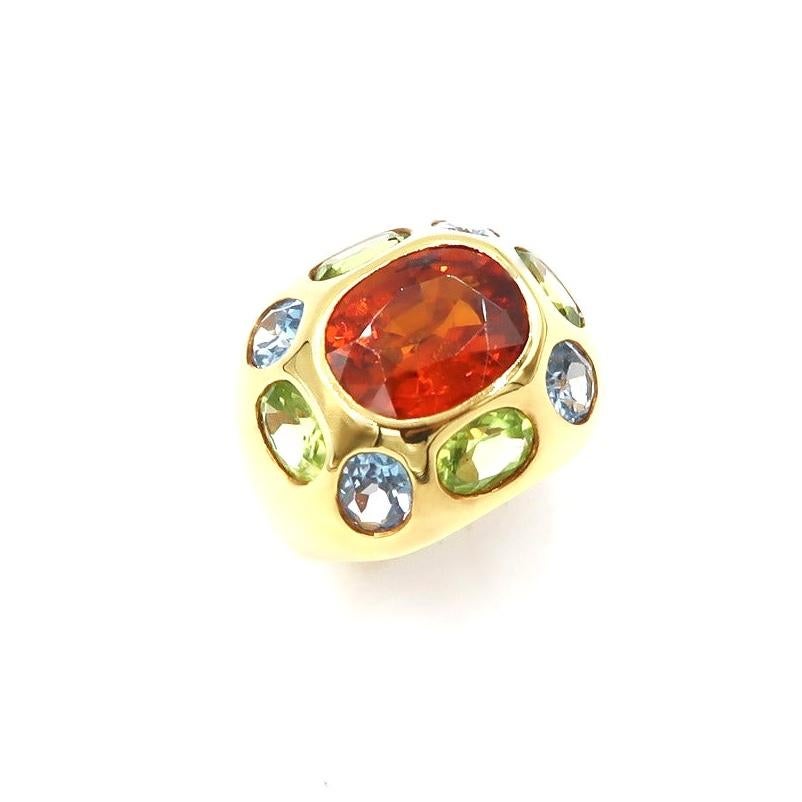 Spessatite 18K Yellow Gold Cocktail Ring embellished with Peridot and Blue Topaz in the Colours of Antelope Valley Blooming Fiery Poppy Fields

Should you wish to have the ring resized, please kindly let us know upon checkout.
Ring Size: 53 / UK M /
