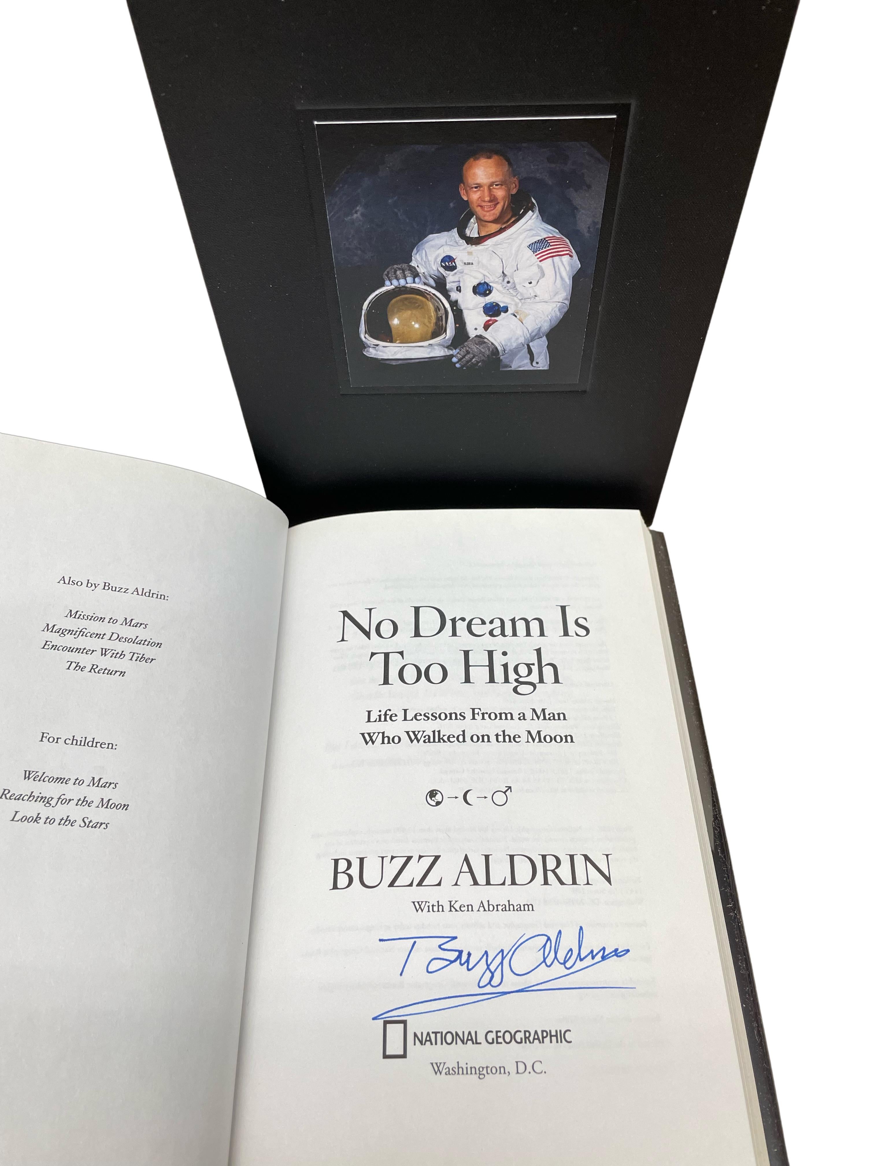 Aldrin, Buzz, with Keith Abraham. No Dream Is Too High: Life Lessons From a Man Who Walked on the Moon. Washington: National Geographic, 2016. First Edition. Signed by Aldrin on the full title page. In publisher's black and gray boards and original