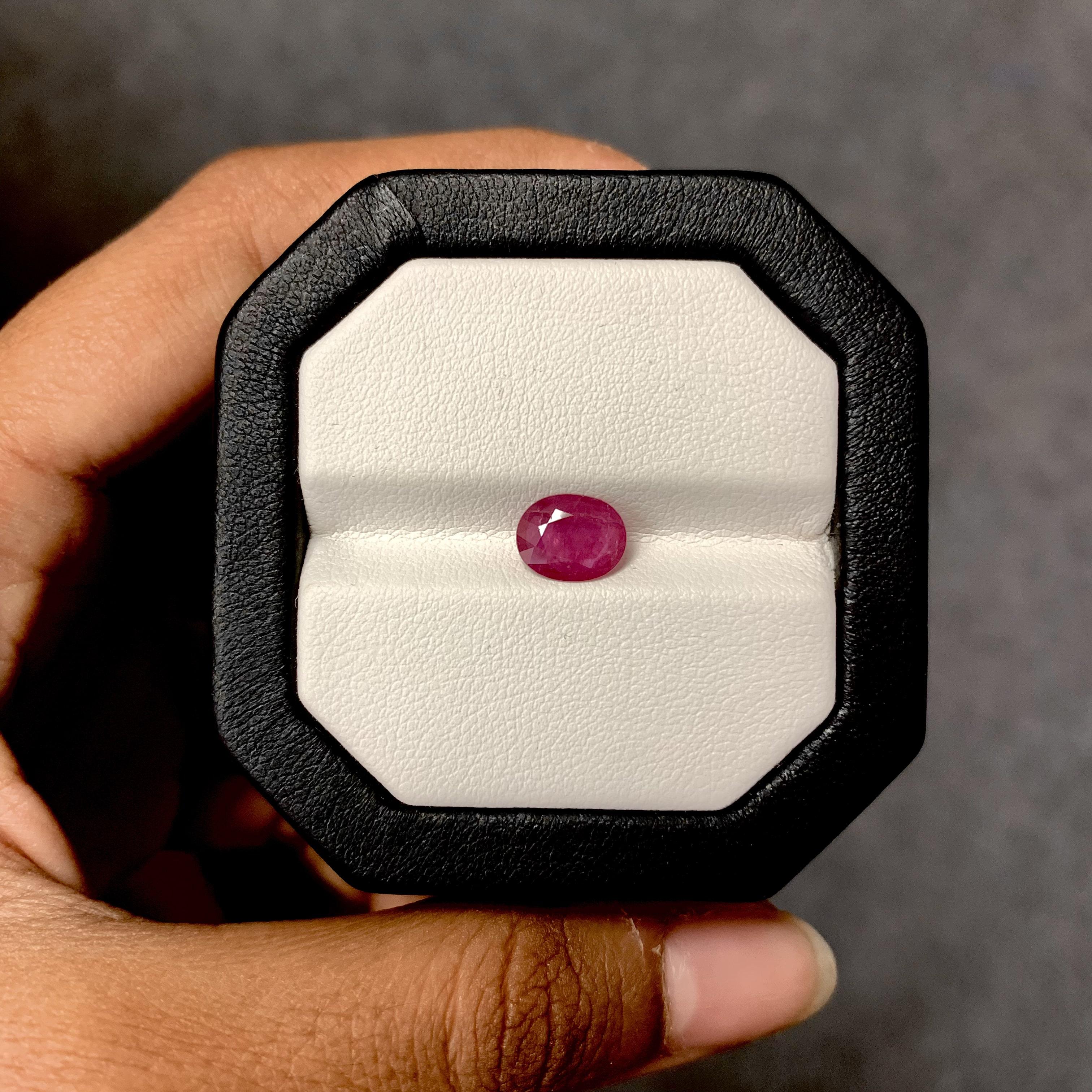 A stunning 1.44 Carat Ruby gemstone. It is completely natural and hasn't undergone any form of treatment. The ruby is an oval shape and its color is a pinkish-red that is absolutely gorgeous!

The measurements of the Ruby stone are 8.38 x 6.71 x