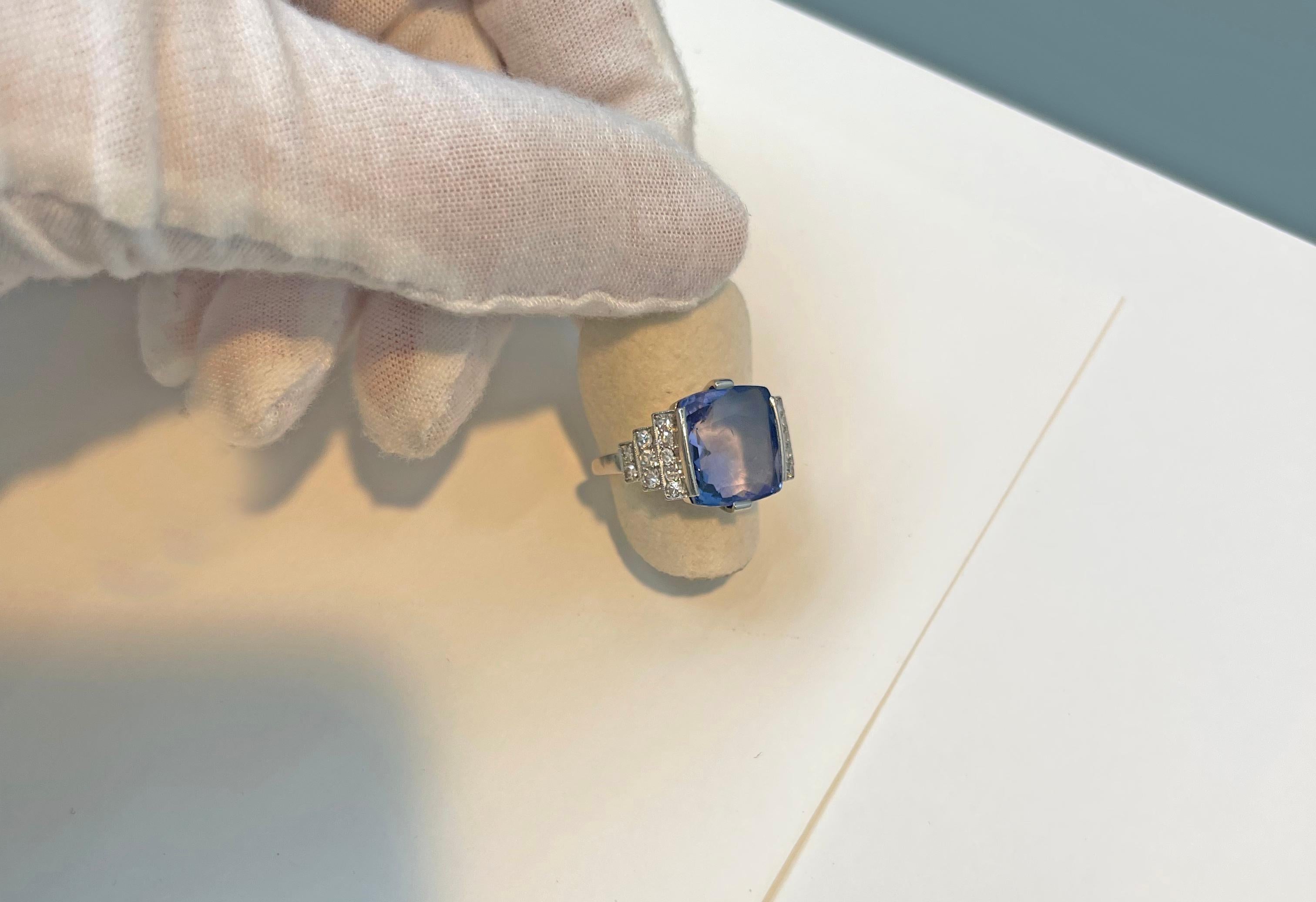 Stunning and shining vintage ring made in platinum with  Ceylon sapphire no heat in the center and embellished by diamond on the sides.
This ring its a really beautiful attire! 

-7 carat circa center stone with 
- 0.75 carat circa of diamonds 