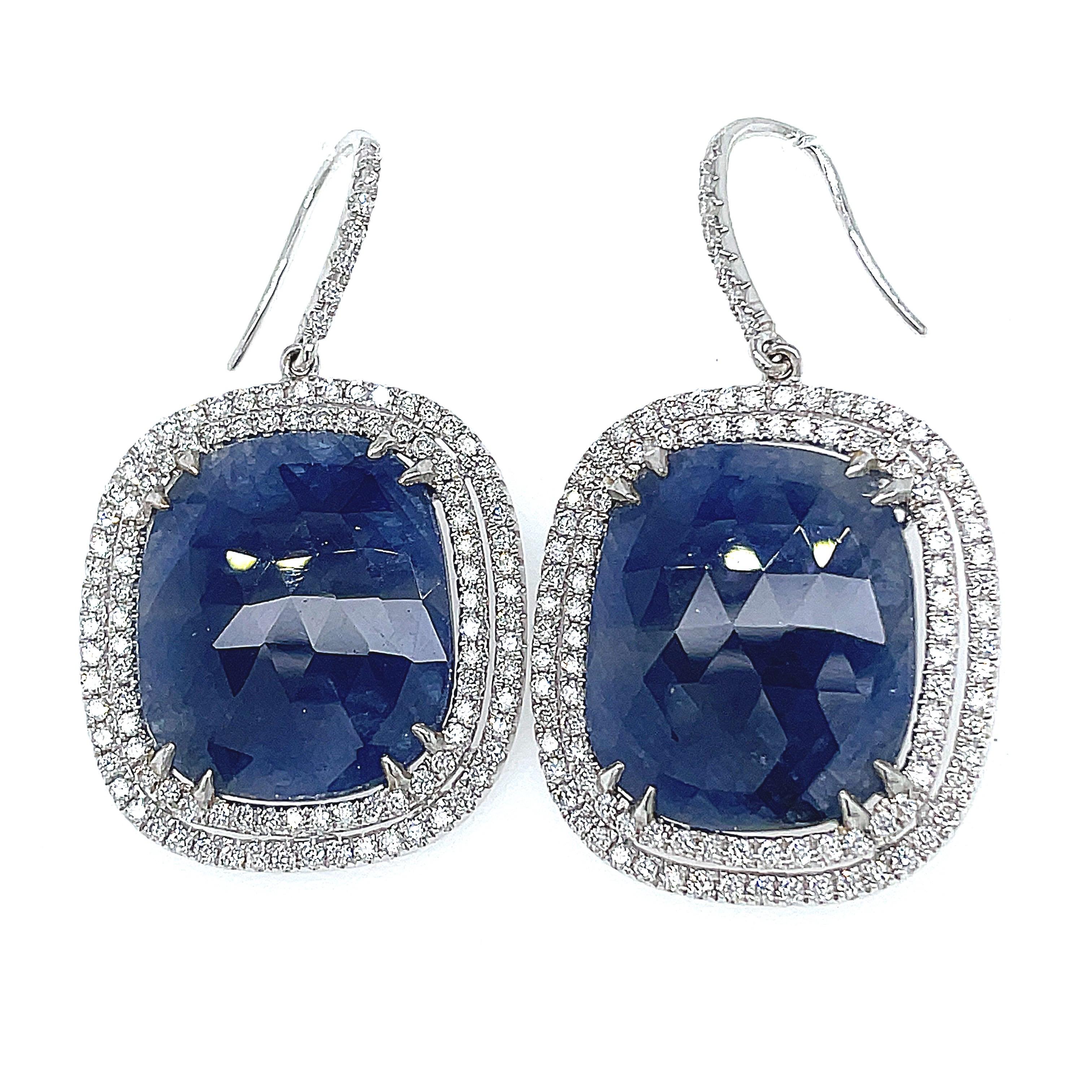 No heat Burma Blue Sapphire Earrings 

This pair of extremely attractive earrings consist of a pair of matched sapphire stones from the mines in Myanmar or Burma. 

As they have only been mined and cut to shape, with no other processes added to it
